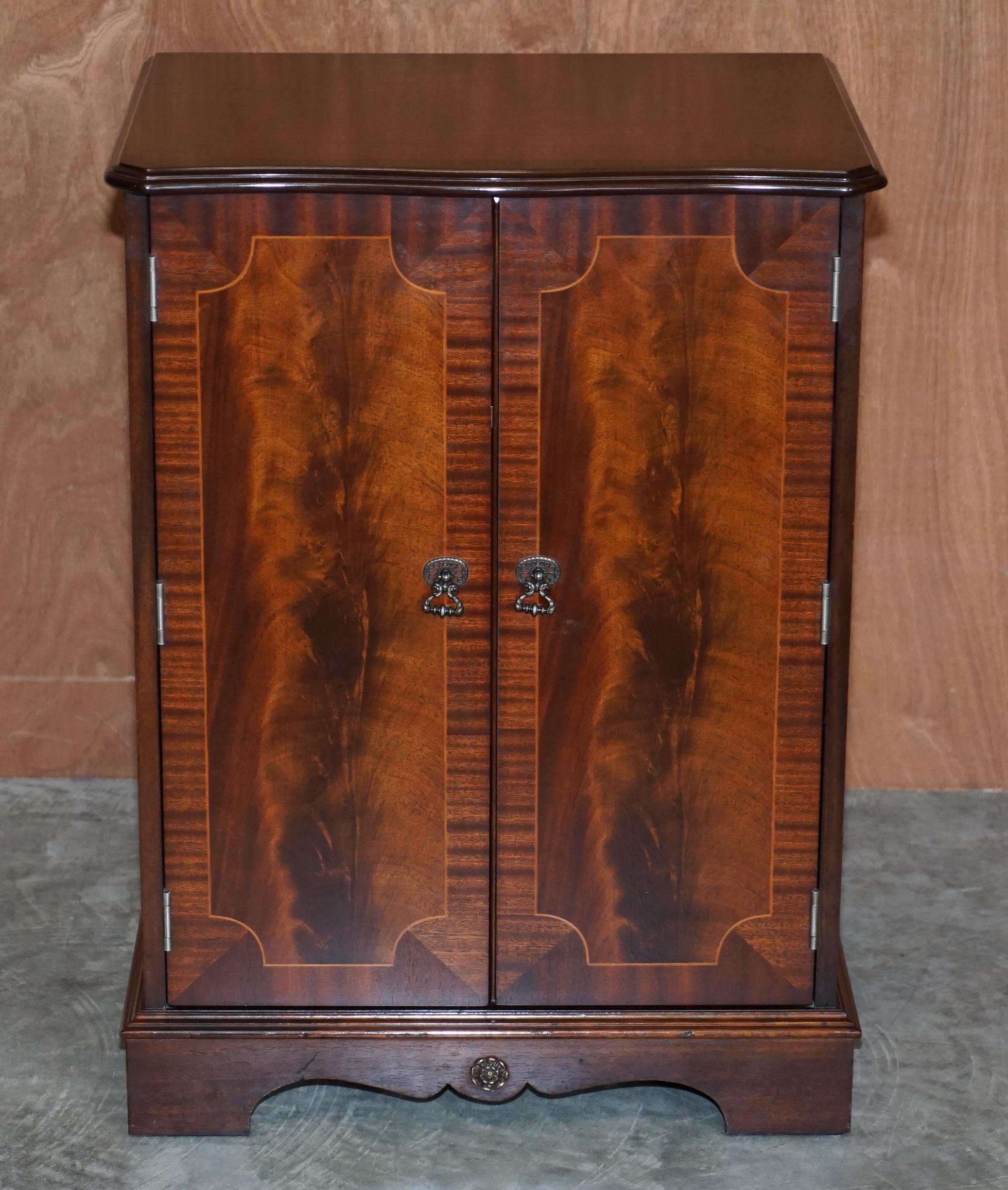 We are delighted to offer for sale this lovely Record Player flamed mahogany cupboard which is hidden as a Victorian style cupboard 

A very well made and decorative piece of metamorphic furniture, the top rises to reveal a space to hold a record