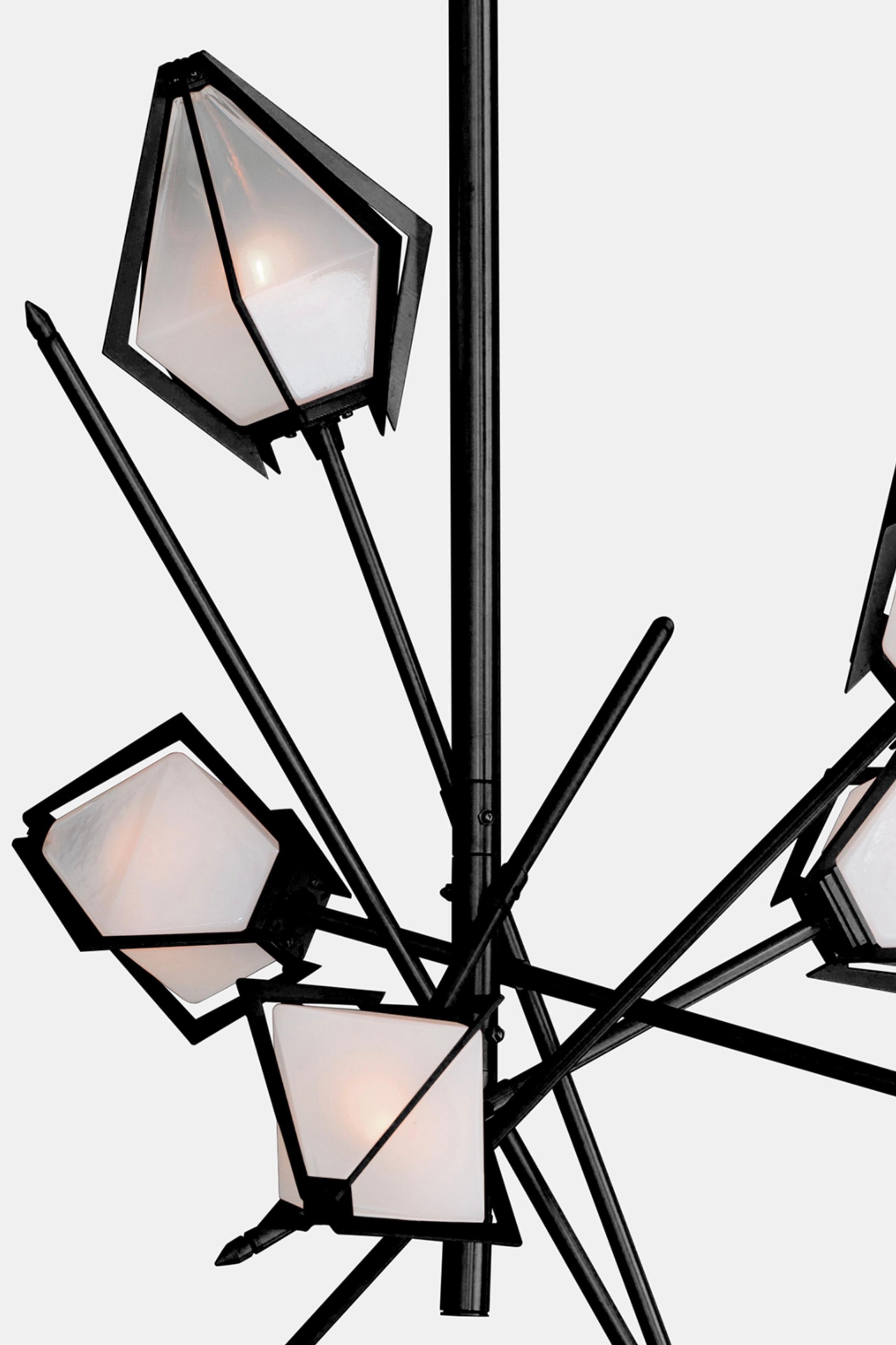 The Harlow Small Chandelier offers an elegant starburst of light that reflects and refracts through its mold-blown glass shade. A sparkling prism, the Harlow Small Chandelier is directly inspired by the world of jewelry with its metallic frame