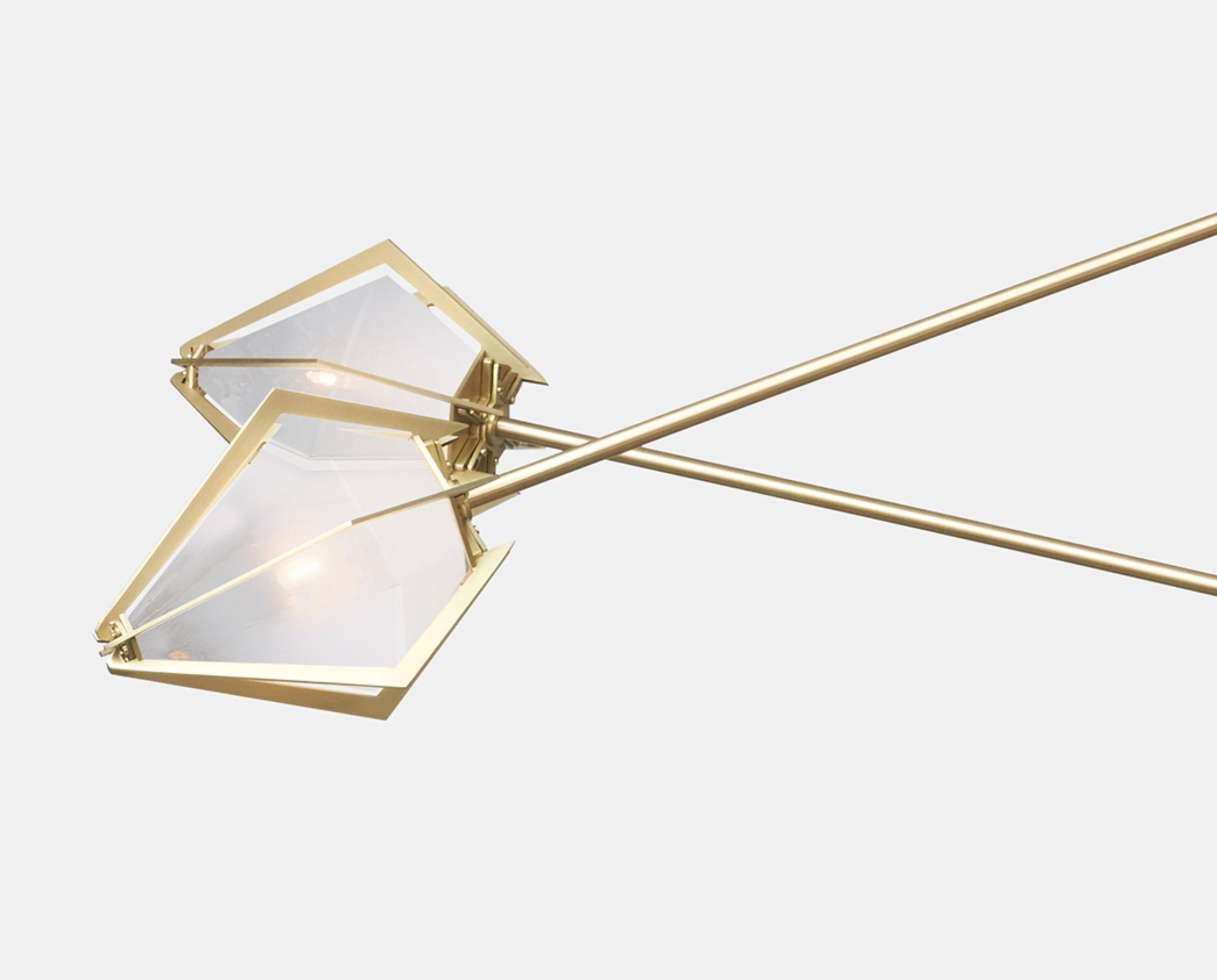 The Harlow Spoke Chandelier Large offers an elegant starburst of light that reflects and refracts through its mold-blown glass shade. A sparkling prism, the Harlow Spoke Chandelier Large is directly inspired by the world of jewelry with its metallic