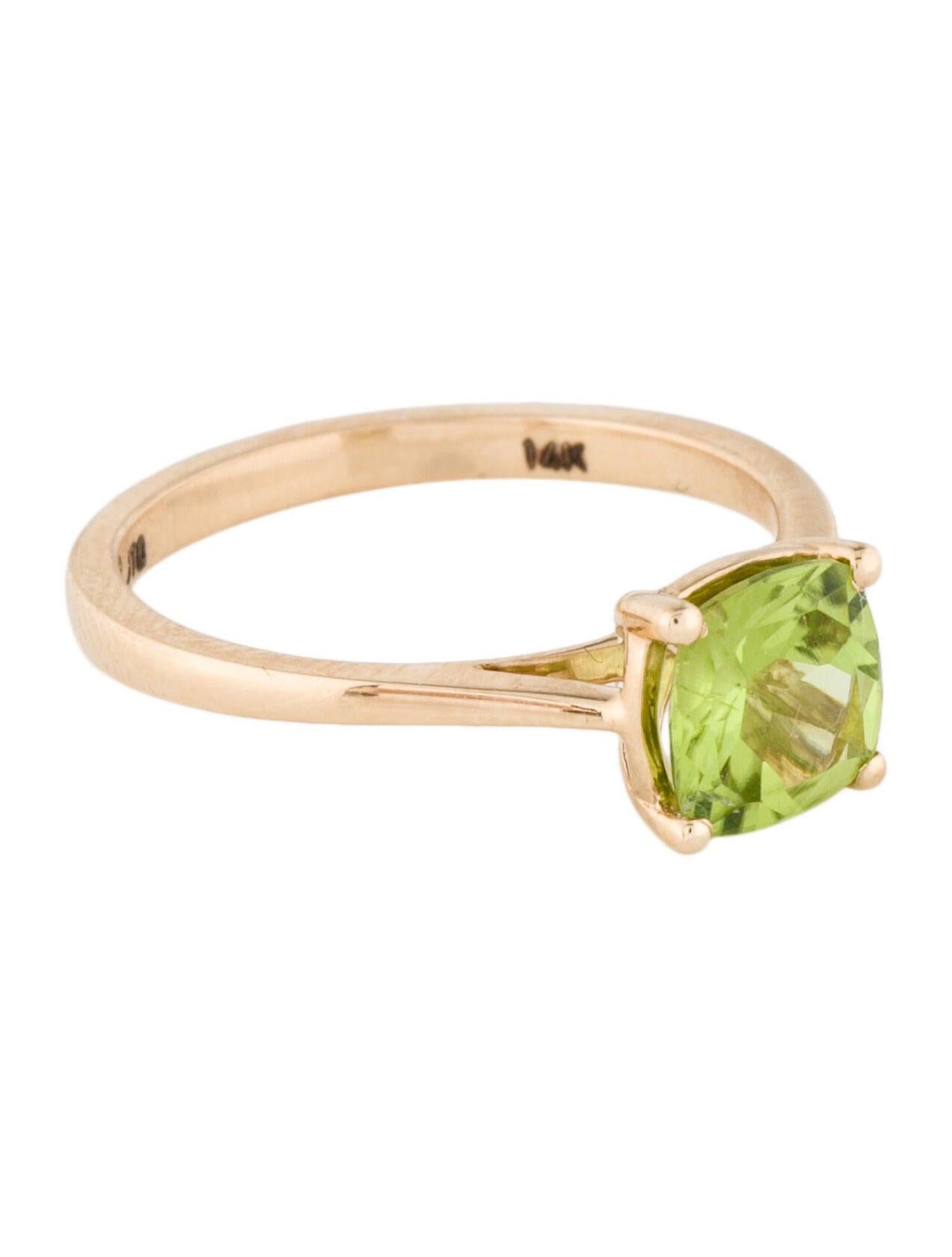 Elevate your style with our exquisite Harmony in Green Peridot Cushion Cut Gold Ring from the renowned Jeweltique collection. This captivating piece is a testament to the timeless allure of nature's treasures. Carefully crafted in 14k yellow gold,