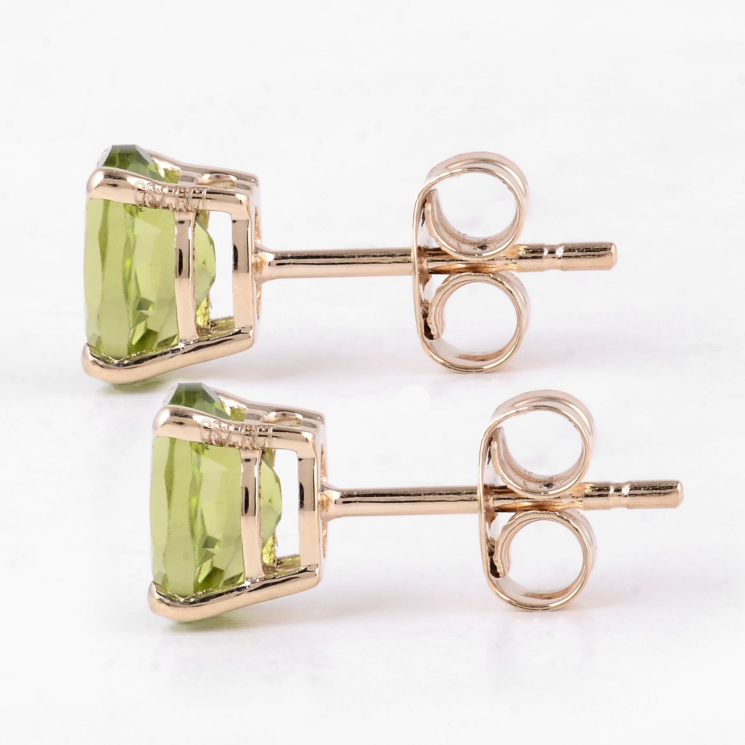14K 2.13ctw Peridot Stud Earrings - Vibrant Gemstones, Elegant Design, Timeless In New Condition For Sale In Holtsville, NY