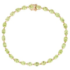 14K Peridot Oval Link Bracelet - Vibrant Gemstones, Classic Elegance, Timeless