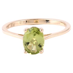 "Harmony in Green Peridot Oval Ring - A Celebration of Natural Elegance"