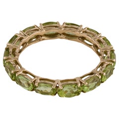Exquisite 14K Peridot Eternity Band Ring - Size 7.5 - Elegant & Classic Jewelry