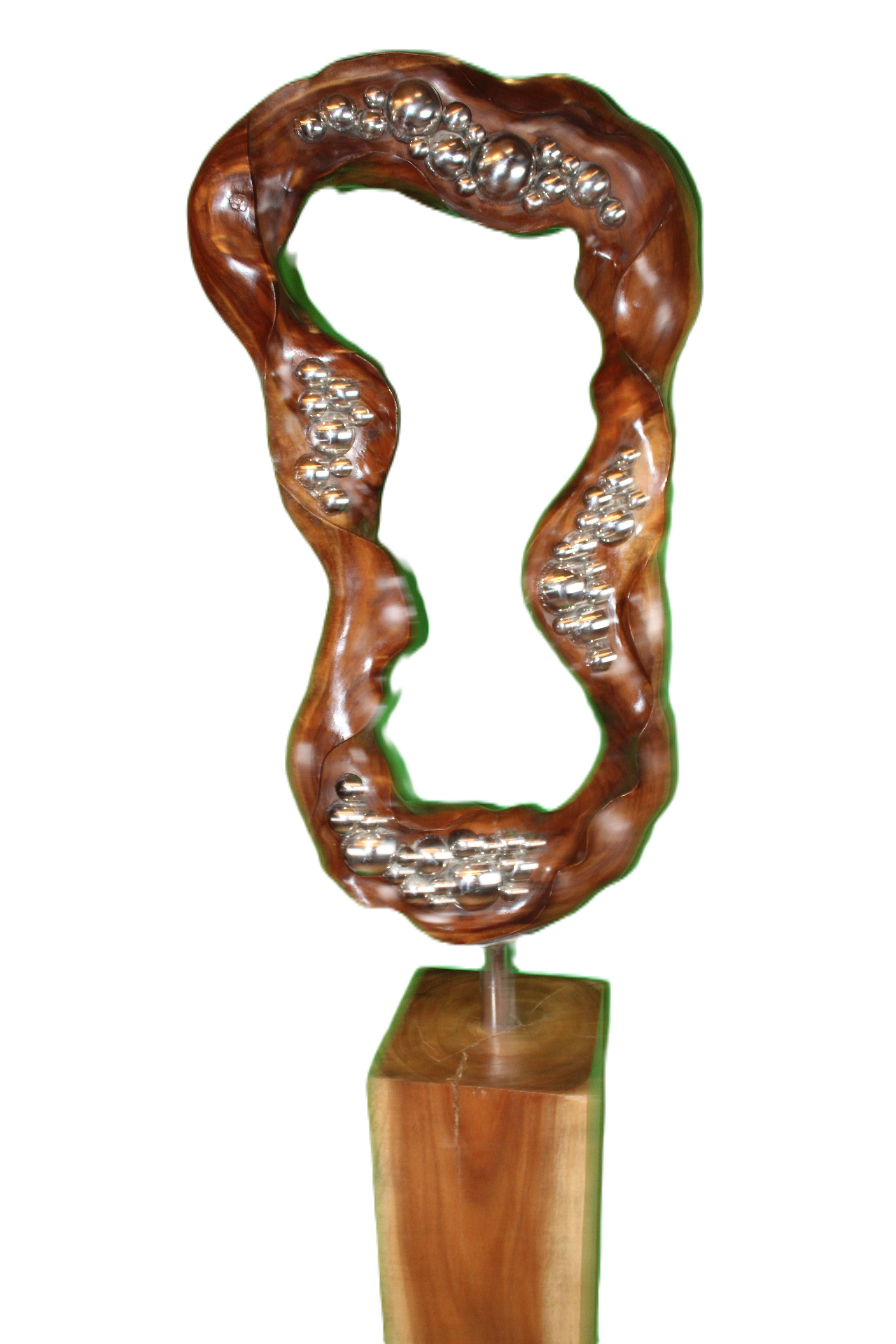 Intagliato a mano L'armonia svelata: Scultura astratta in legno balinese in vendita