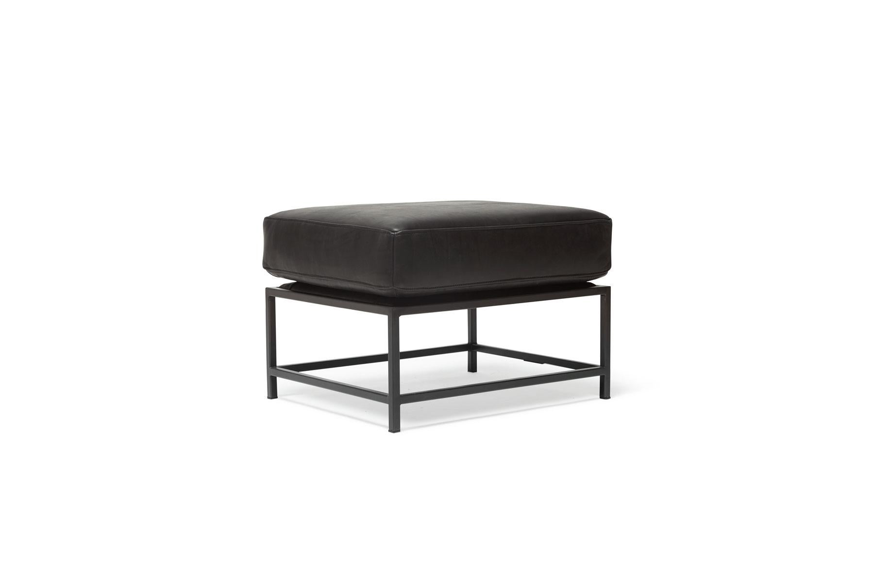 Designed to pair with any of the seating options in Stephen Kenn's Inheritance Collection, the ottoman is a great way to add a lounge element to your seating arrangement for maximum comfort.

This variation is upholstered in a soft, deep black
