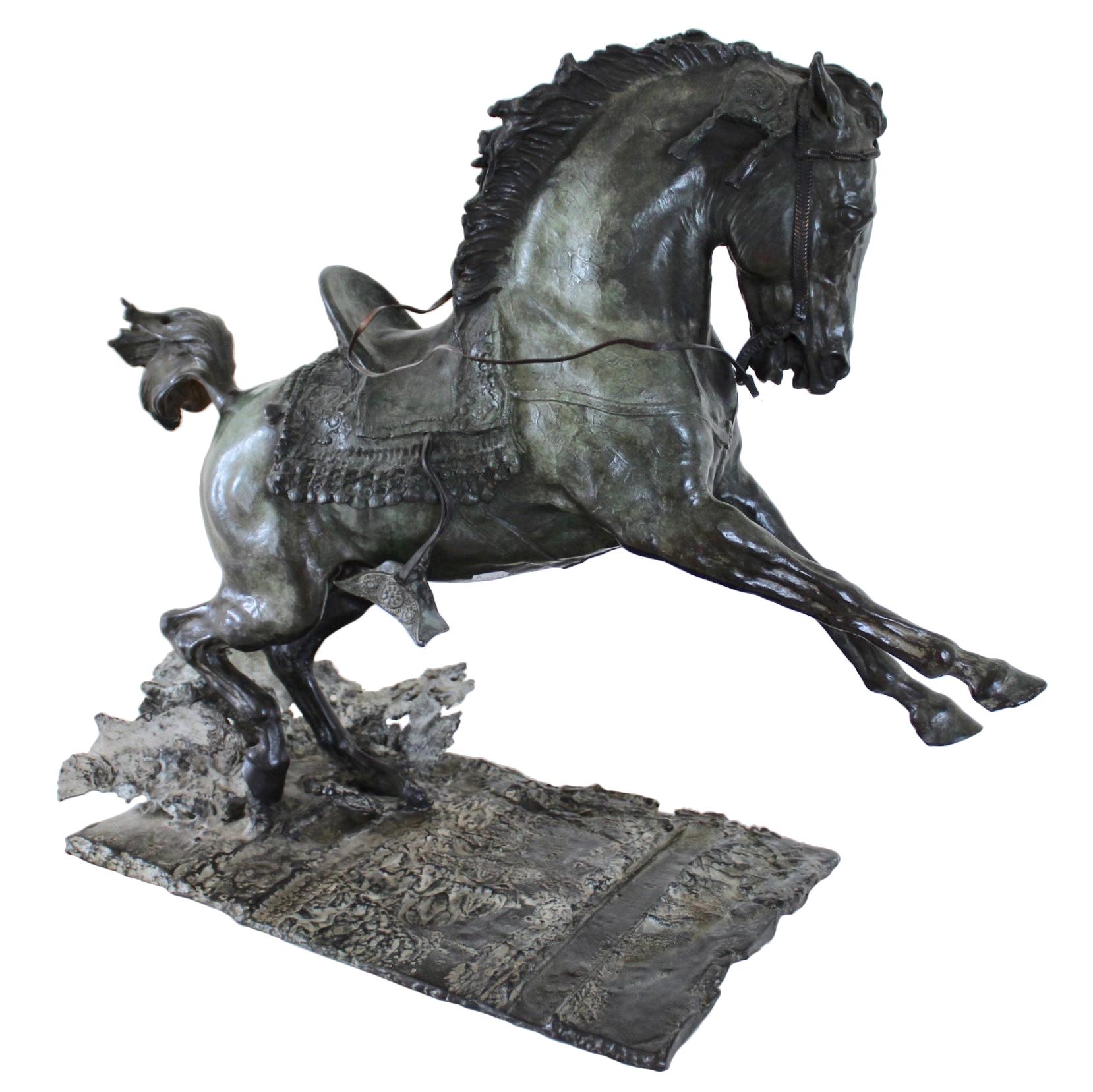 Exceptional bronze sculpture depicting a harnessed Arabian horse in action with a fabulous patina. Made in 1998 By Frederic Jager (1957-) French sculptor of animals, particularly Horses. According to French law (1960's) to be a qualified 