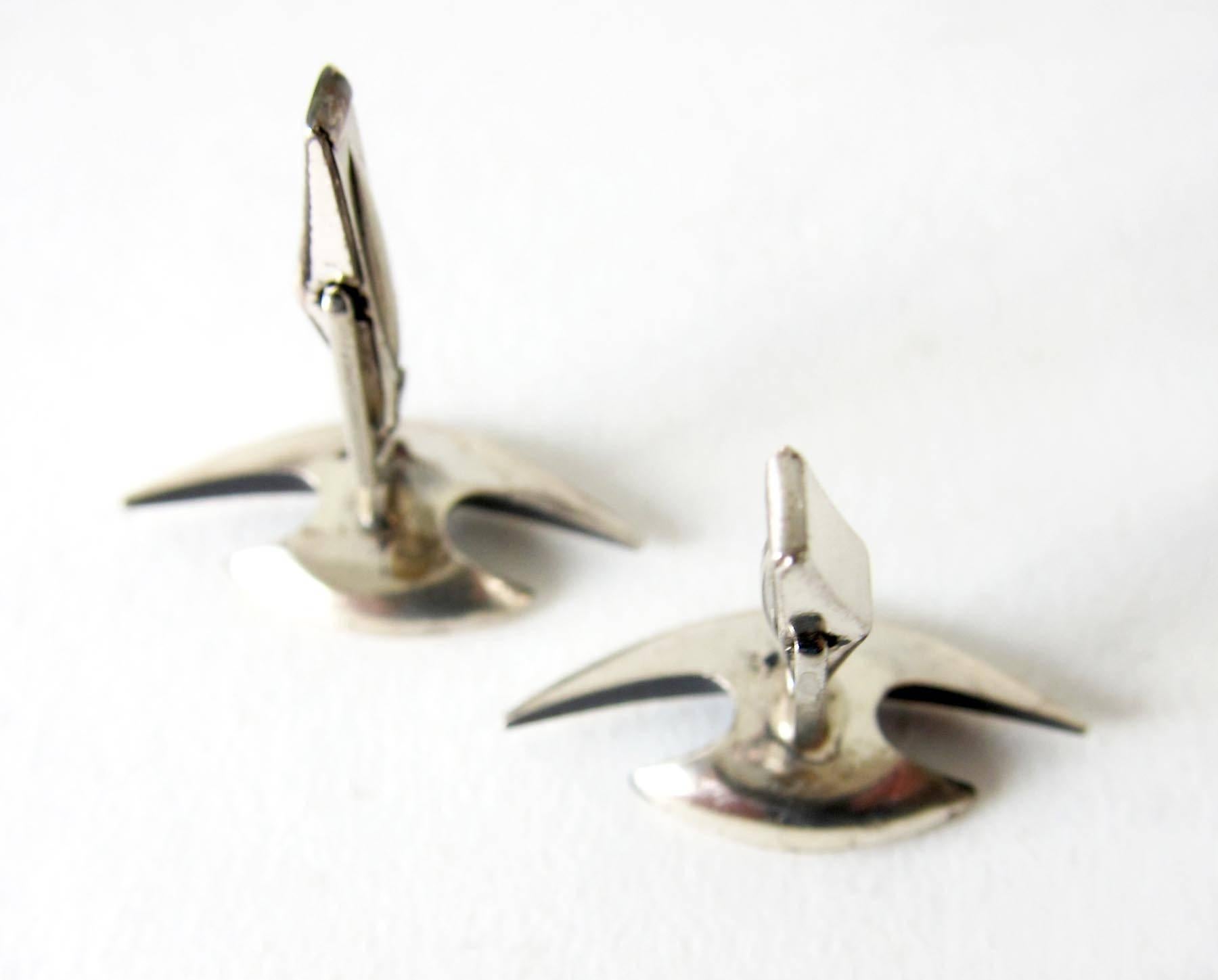 Sterling silver sculptural cufflinks created by Harold Fithian, circa 1950's.  Cufflinks measure .5