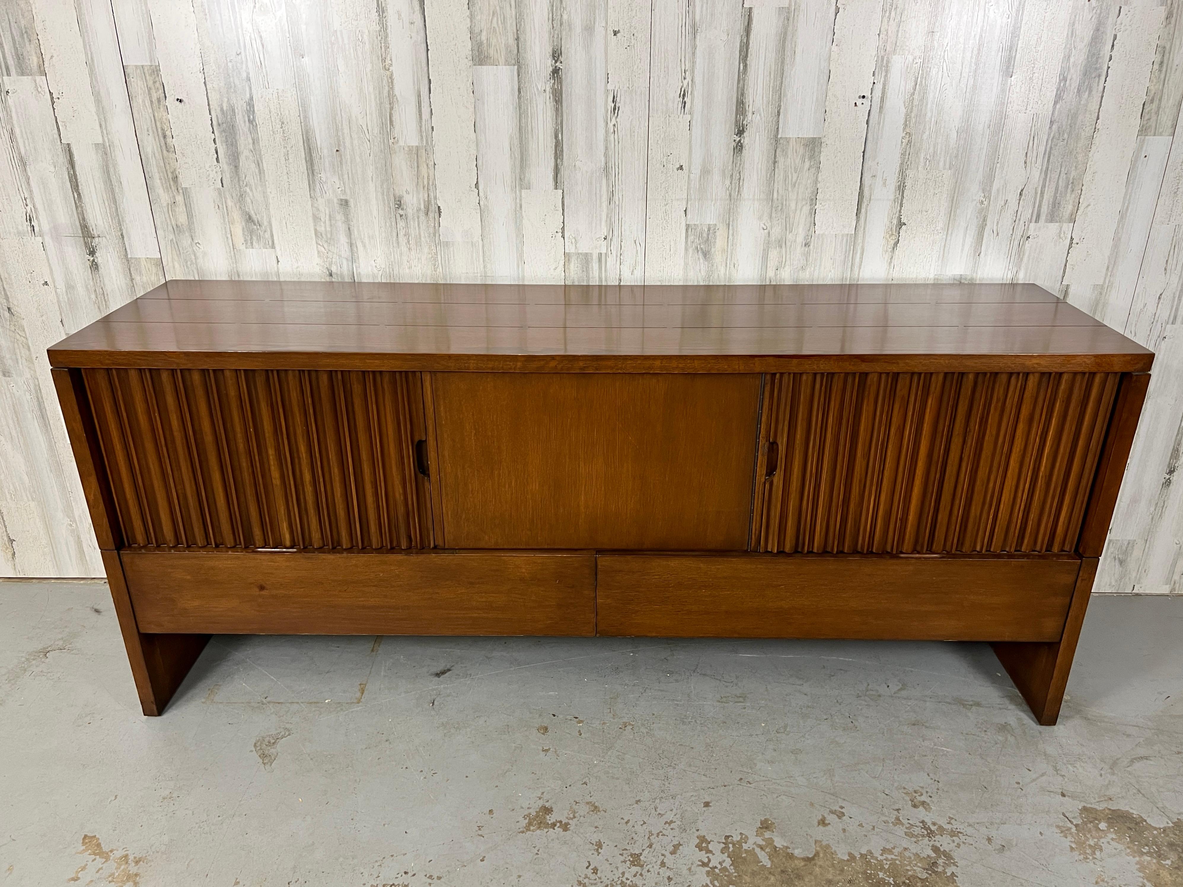 Mid-Century Modern Harold Schwartz for Romweber Buffet. Many storage openings for flatware & china. A unique butterfly joinery- bow-tie design on the top and sides. Very heavy and sturdy piece.