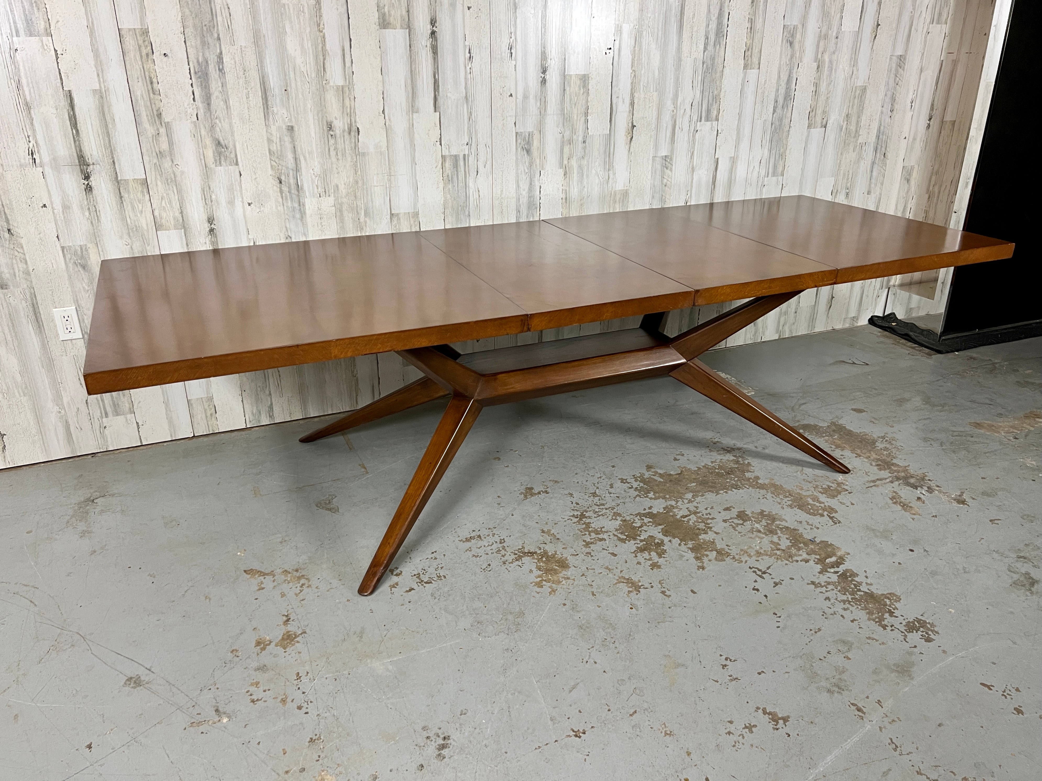 Harold Schwartz for Romweber Spider Leg Extendable Dining Table. Parquetry top, sculpted wood legs, and cutlery drawers on each end. A great table for people who love to entertain! 
There are two leaves each measures 20