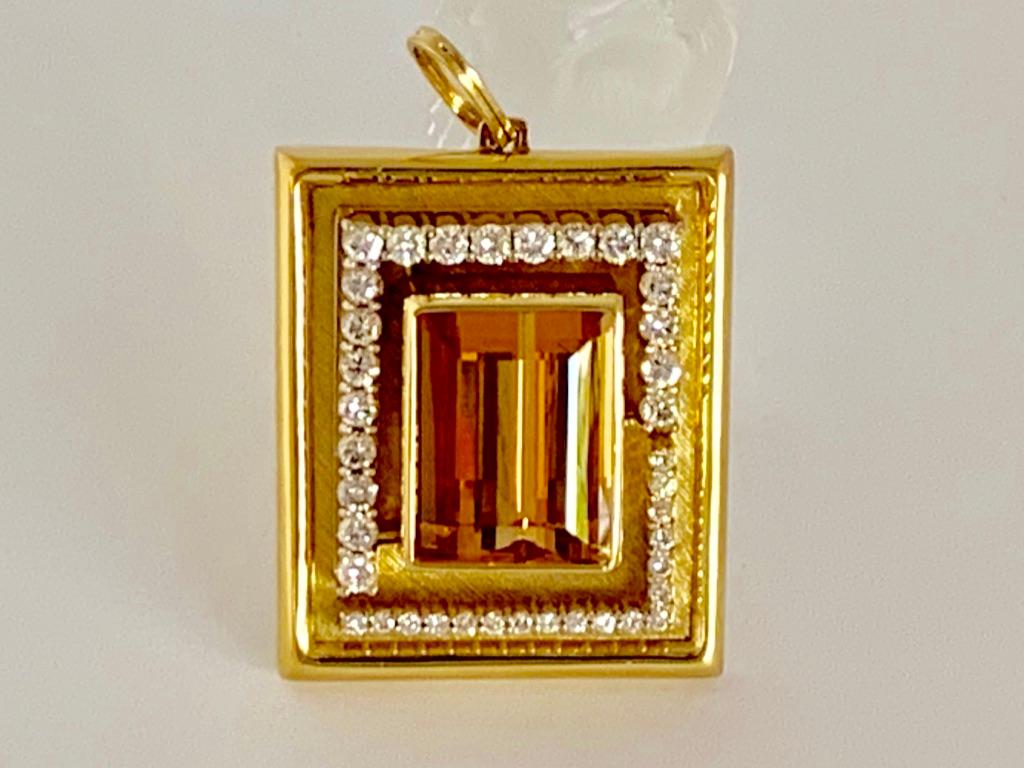 Thanks for taking a look at this very fine Burle Marx Imperial Topaz and Diamond Pendant. This piece really is a show stopper! The Imperial Topaz is 42 carats in size, surrounded by 3 carats of diamonds. It is made with 39 grams of 18 karat gold.