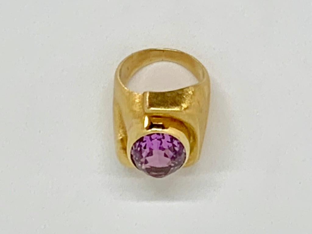 Thanks for taking a look at this Burle Marx Kunzite ring. This is an exceptionally colored stone, and photographs do not do it justice. It is a size 5 and may be sized up or down up to 2 sizes. The stone is .70 inches tall, and .40 inches wide. It's
