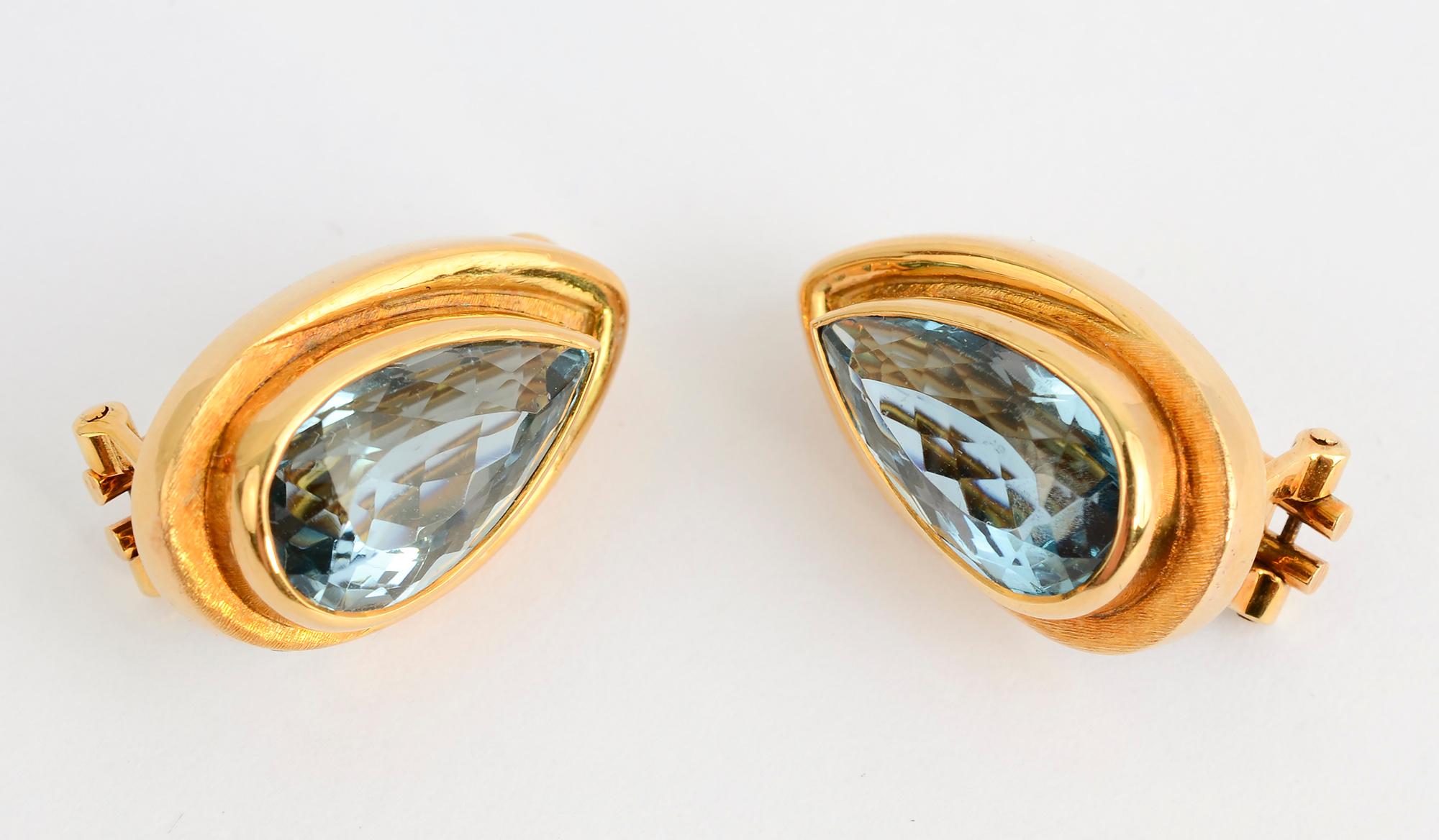 Beautiful blue topaz earrings  by Brazilian designer, Haroldo Burle Marx. Marx was known, in part, for the fine quality of the stones he worked with. The earrings are 1 inch in length and 9/16