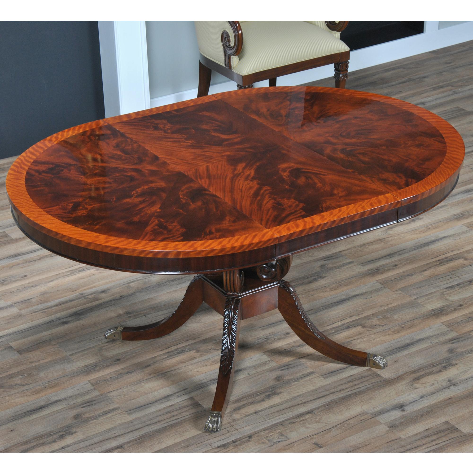 The Lyre or Harp Base Dining Table. Always popular this round to oval shaped dining table rests on a lyre base which matches many other items in our collections. Please see the related products tab below for chairs, benches and other related pieces