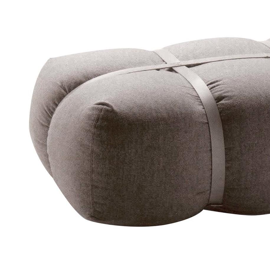 The wonderfully original Harper Pouf will bring a fresh and innovative look to your modern home decor. Made with comfort in mind, it features a goose down and soft polyurethane filling. The pouf also has a removable cover in gray fabric and Version