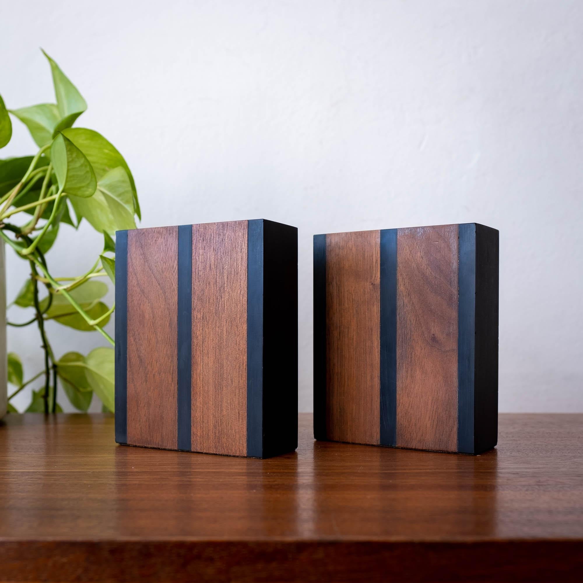 Slate and walnut bookends by Harpswell House. These are often attributed to Paul Evans and Phillip Lloyd Powell, however that is probably not accurate. Nonetheless, they are well made and heavy. Crafted in Maine, 1960s.