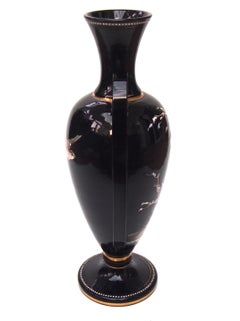 Harrach Victorian black glass winged vase enamelled with birds on snowy branches