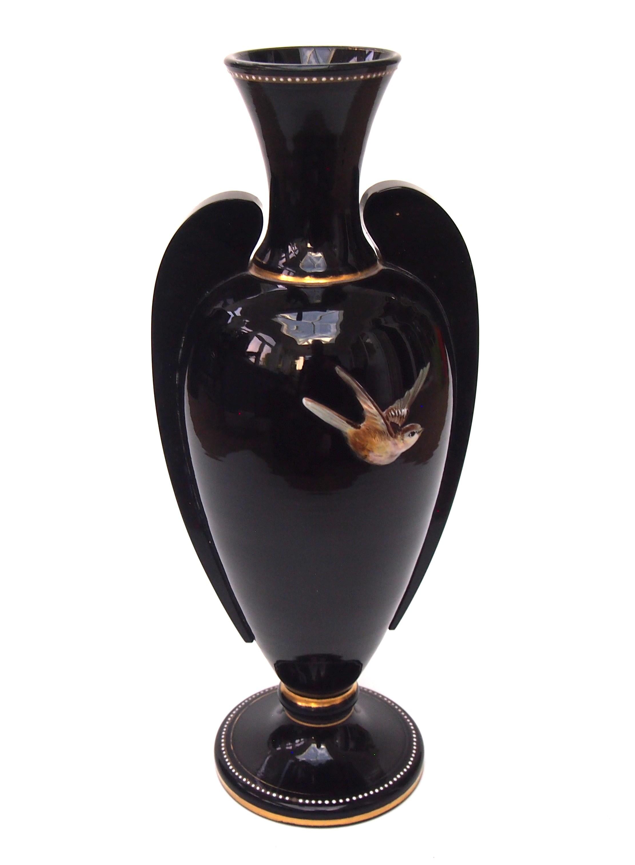 High Victorian Harrach Victorian black glass winged vase enamelled with birds on snowy branches For Sale