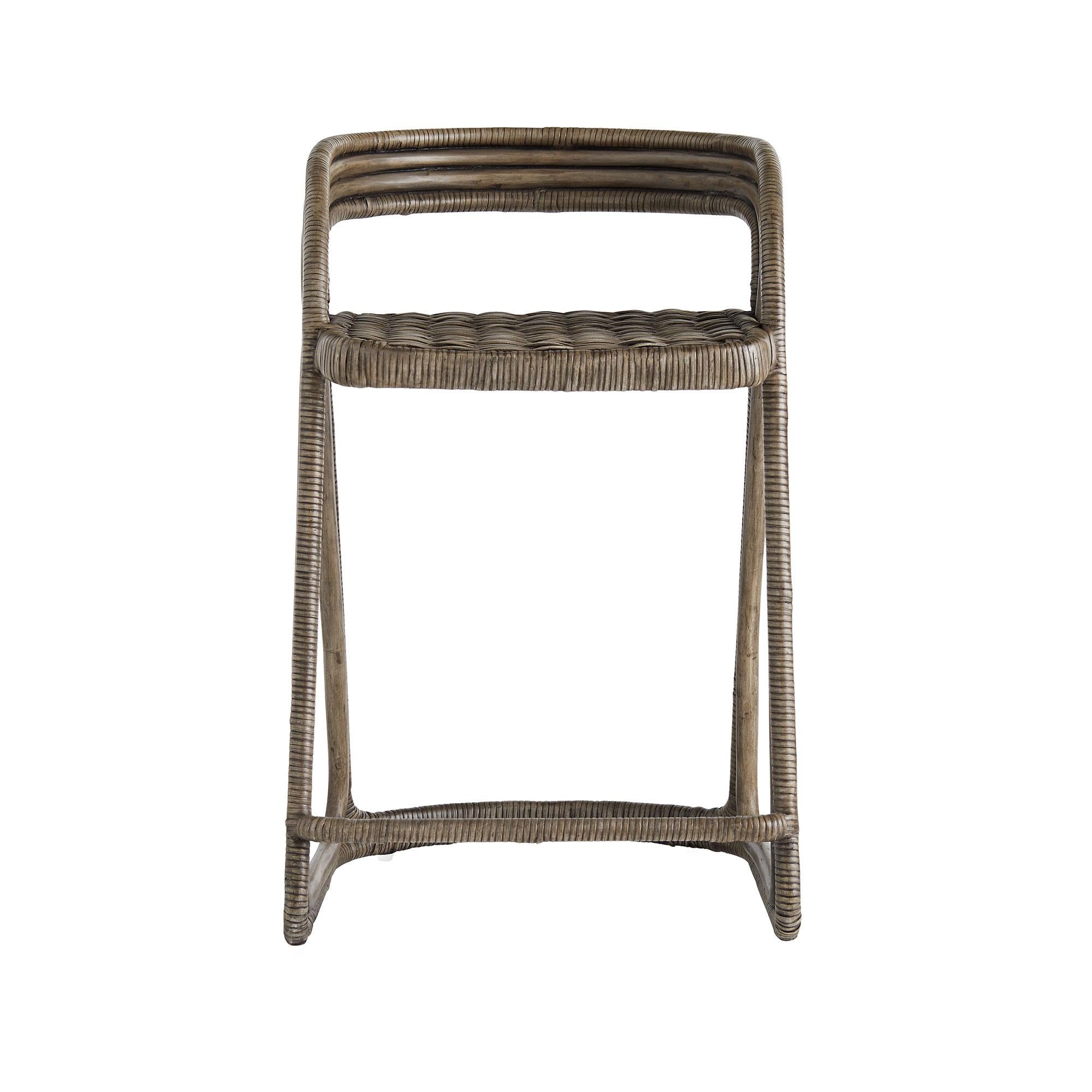 Blending organic materials with expert craftsmanship, this counter stool brings a naturally refined presence to any space. Constructed entirely from rattan, the Harrington stool showcases a hand-woven seat in a traditional cane pattern, while its