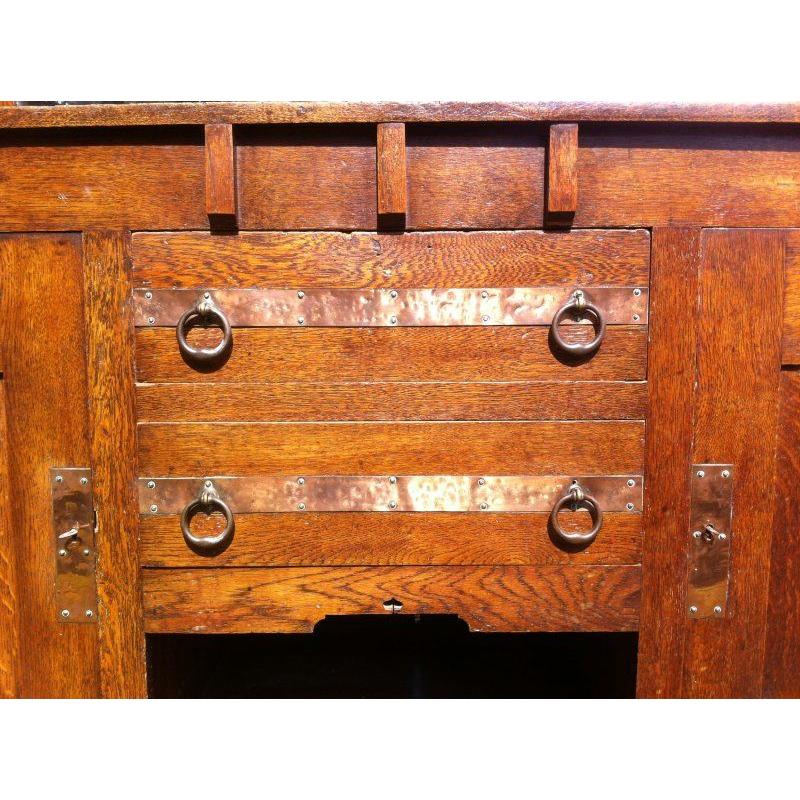Harris Lebus, Attributed. Arts and Crafts Oak sideboard with Glasgow Style glass For Sale 6