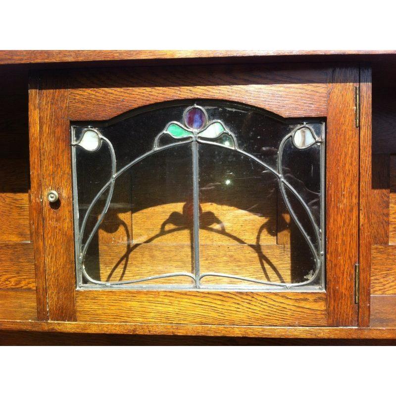 Harris Lebus, Attributed. Arts and Crafts Oak sideboard with Glasgow Style glass In Good Condition For Sale In London, GB