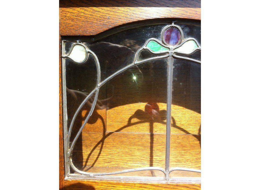 Harris Lebus, Attributed. Arts and Crafts Oak sideboard with Glasgow Style glass For Sale 1