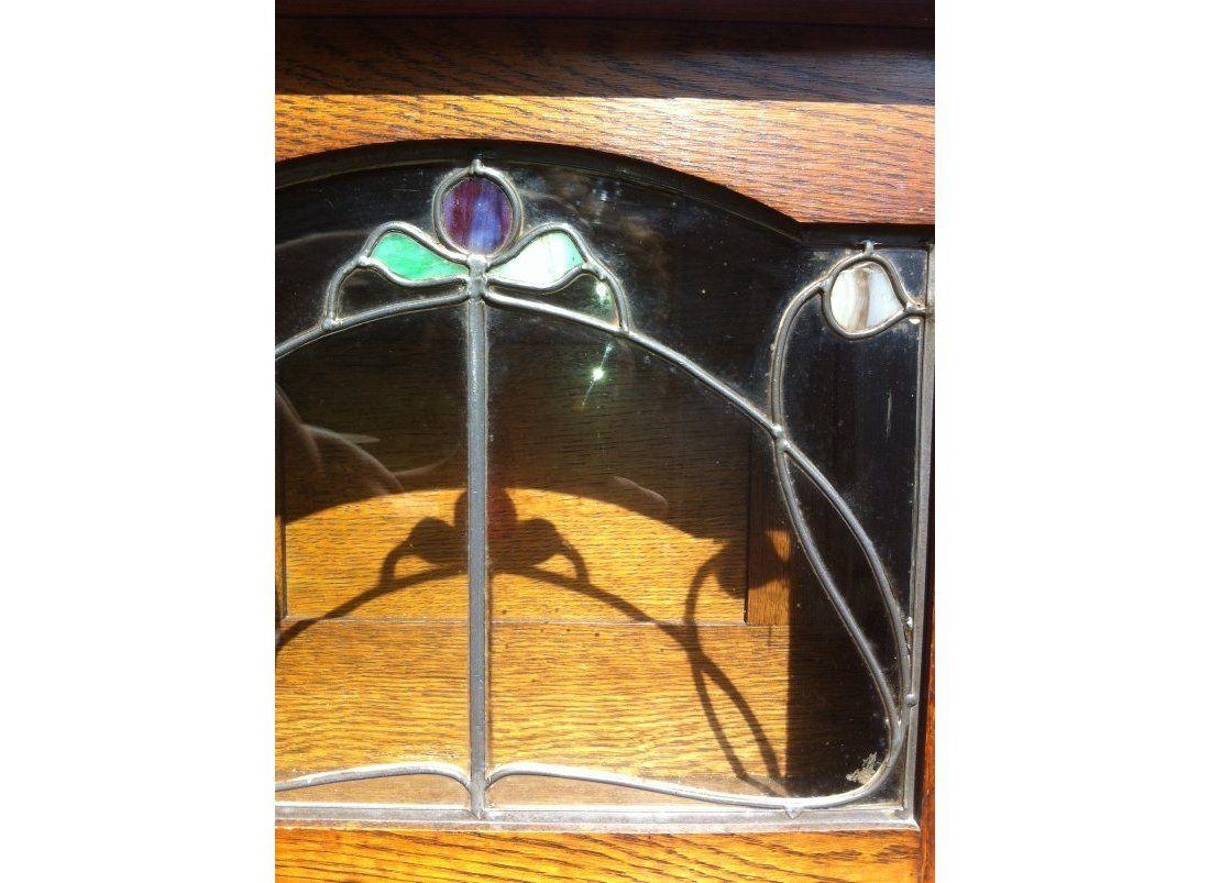 Harris Lebus, Attributed. Arts and Crafts Oak sideboard with Glasgow Style glass For Sale 2