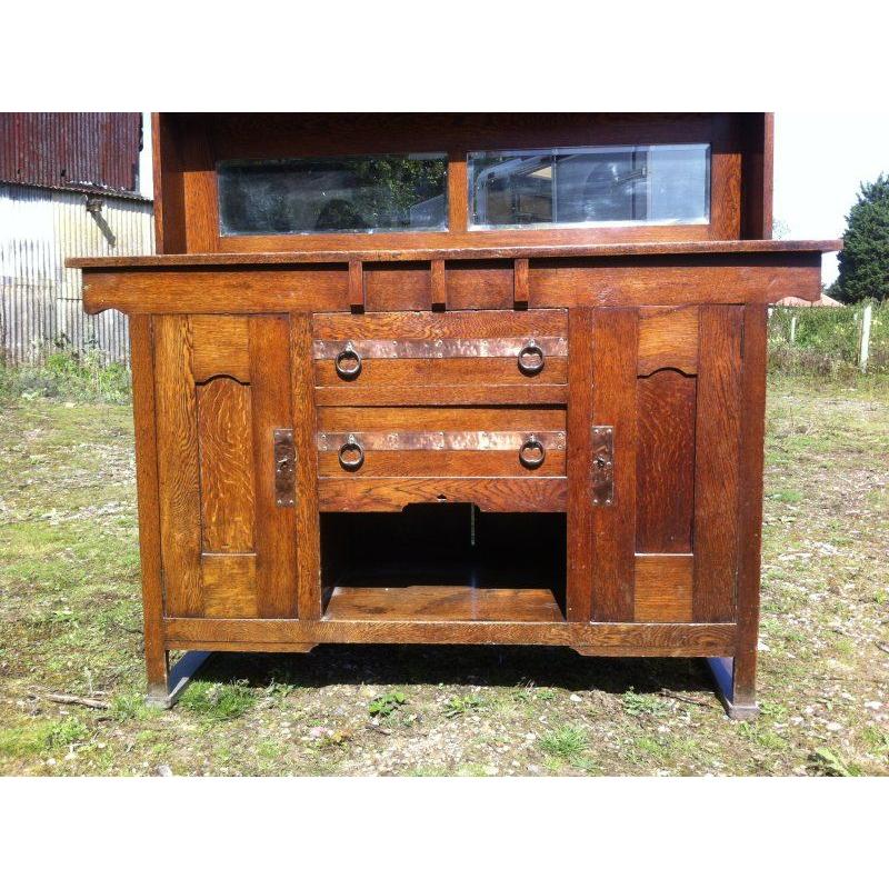 Harris Lebus, Attributed. Arts and Crafts Oak sideboard with Glasgow Style glass For Sale 3