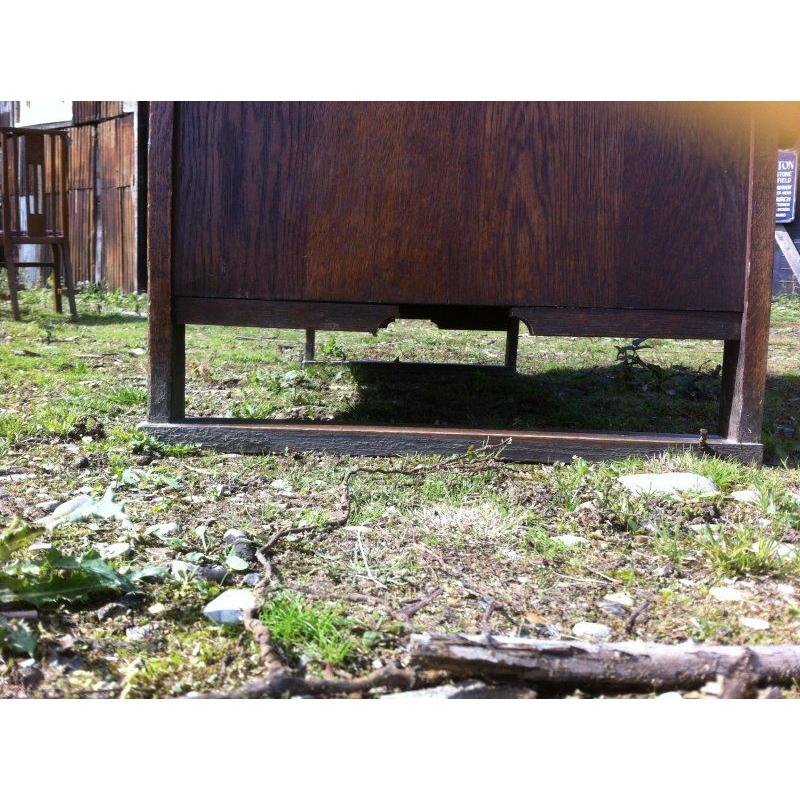 Harris Lebus, Attributed. Arts and Crafts Oak sideboard with Glasgow Style glass For Sale 5