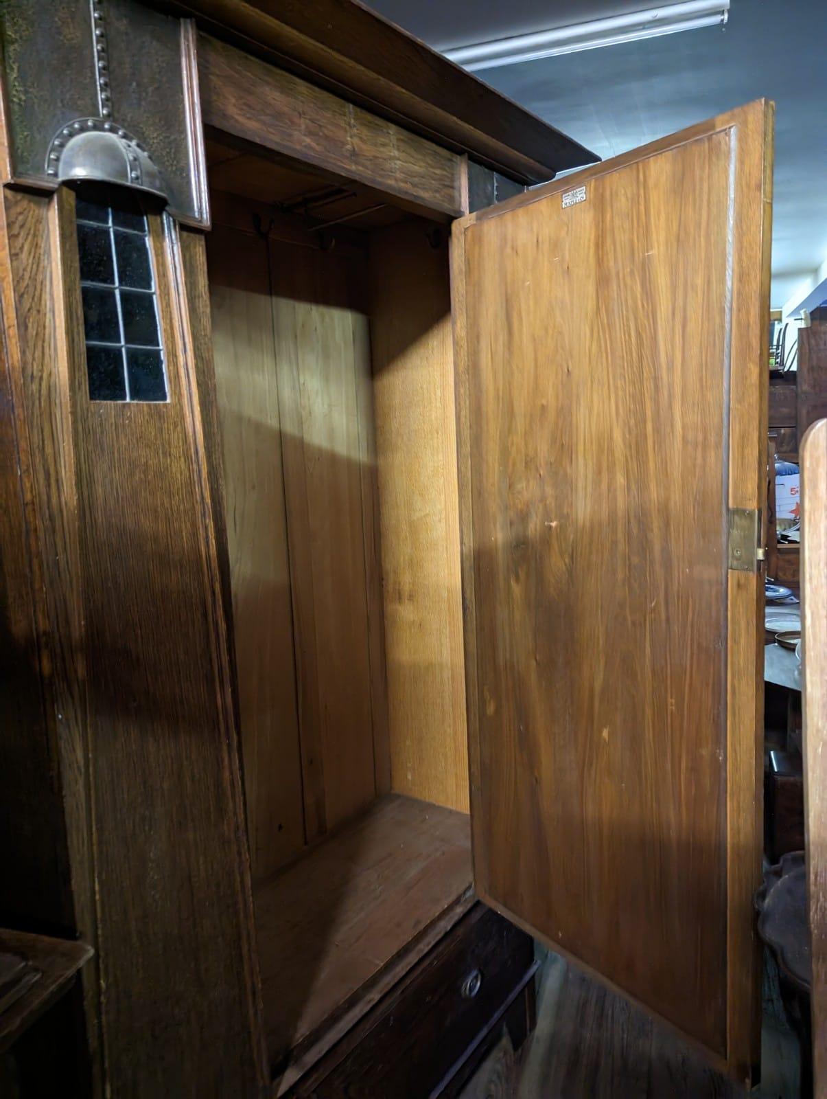 Maple & Co, An English Arts & Crafts Oak Wardrobe with Decorative Copper Details In Good Condition For Sale In London, GB