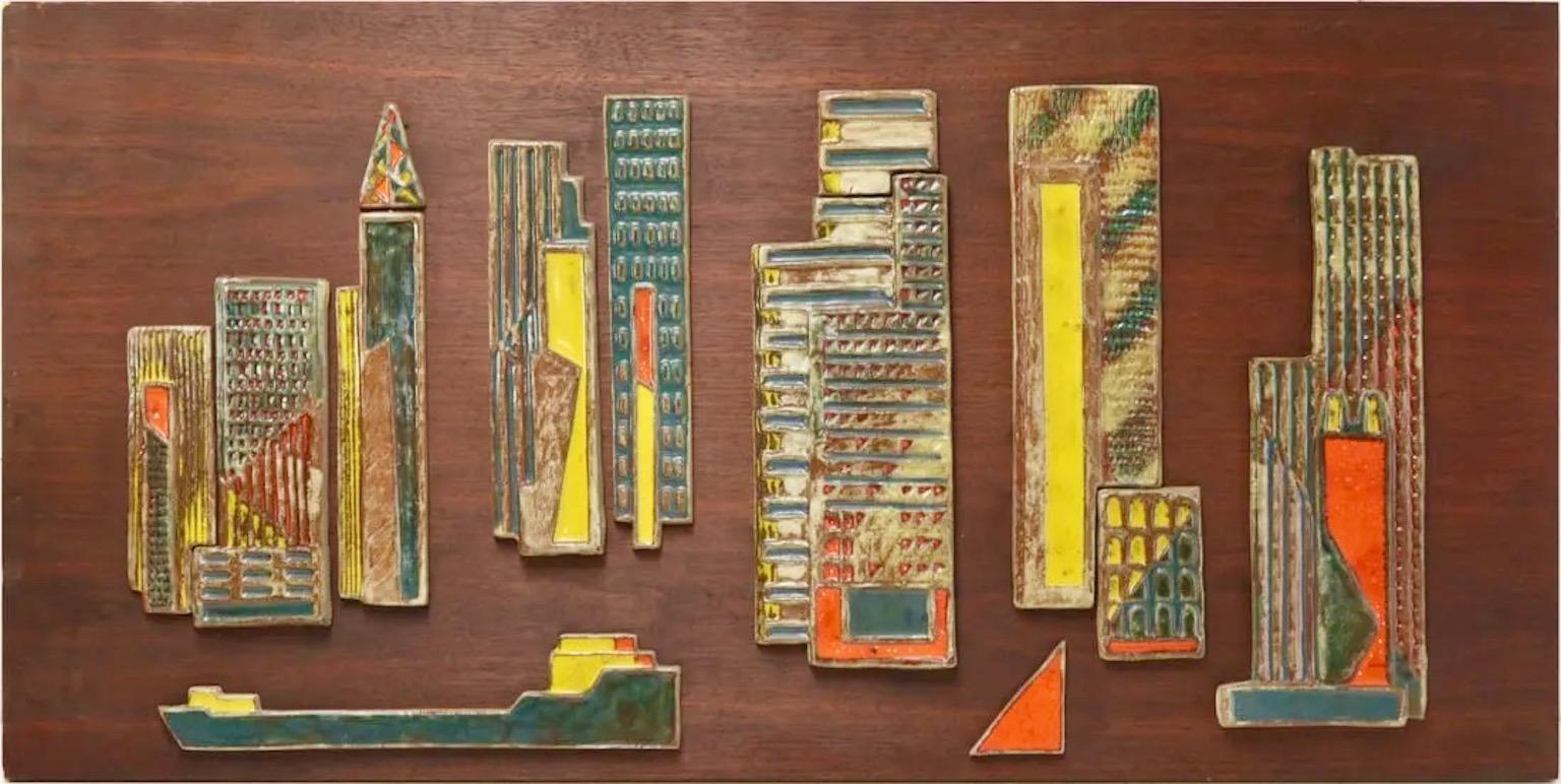 Harris G. Strong American (1920-2006) tile mosaic cityscape mounted on large walnut slab from the series of New York City cityscapes he produced whilst living in the Bronx from 1950 to the late 1960s.  Verso inscribed '53718' in ink.

Harris G.
