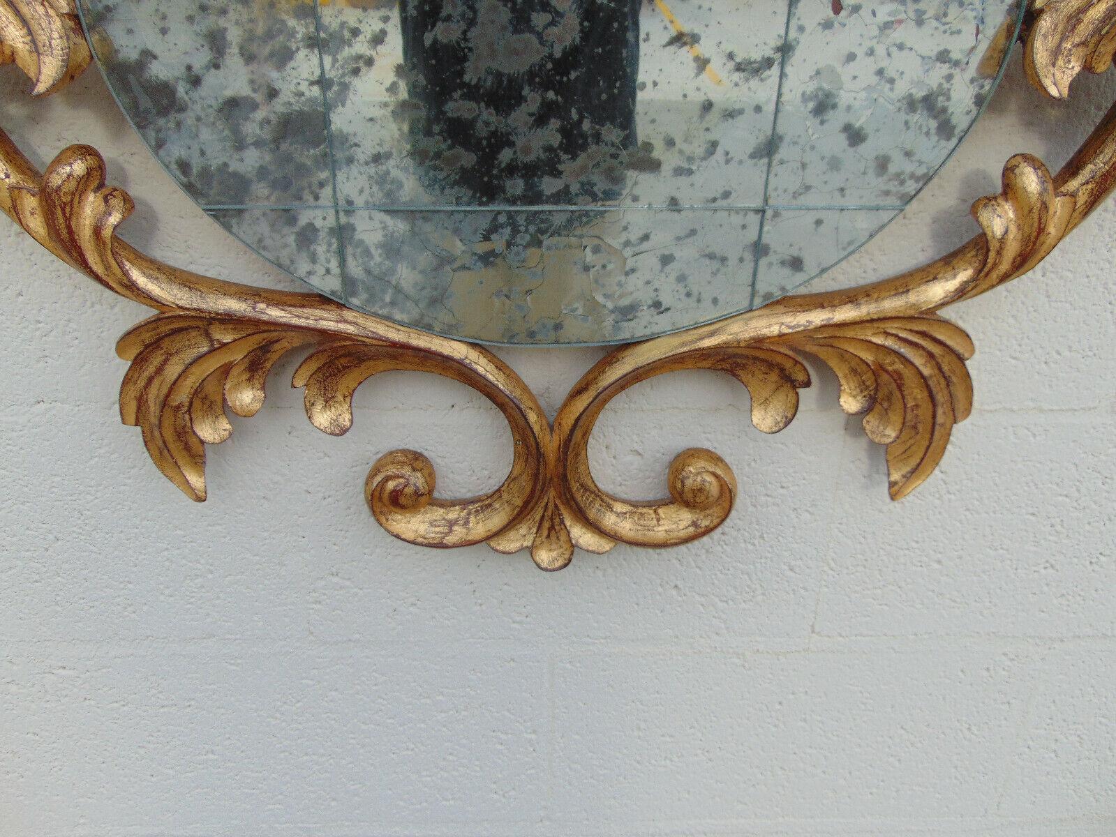 20th Century Harrison & Gil Carved Giltwood Rococo Mirror with Antiqued Distressed Glass For Sale