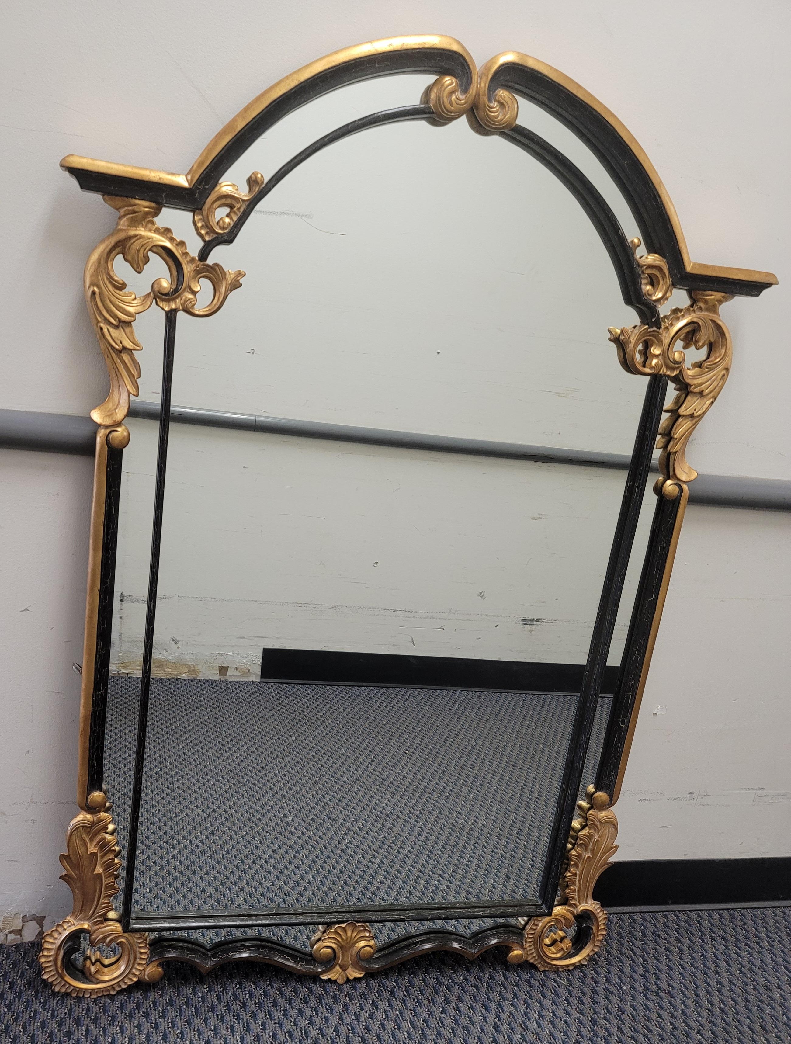 American Harrison & Gil Dauphine Neoclassical Parcel Gilt Ebonized Fruitwood Frame Mirror For Sale