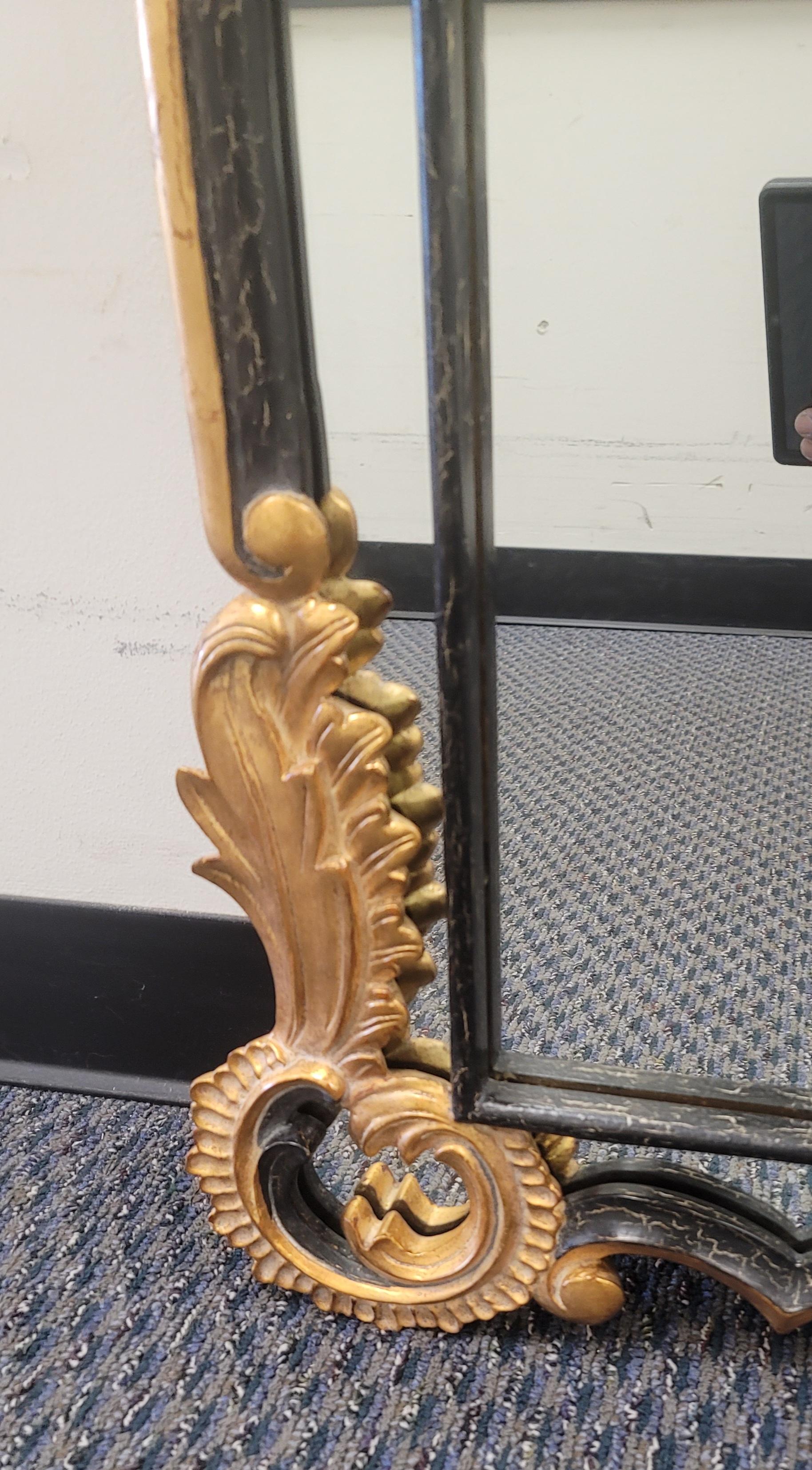 Harrison & Gil Dauphine Neoclassical Parcel Gilt Ebonized Fruitwood Frame Mirror In Good Condition For Sale In Germantown, MD