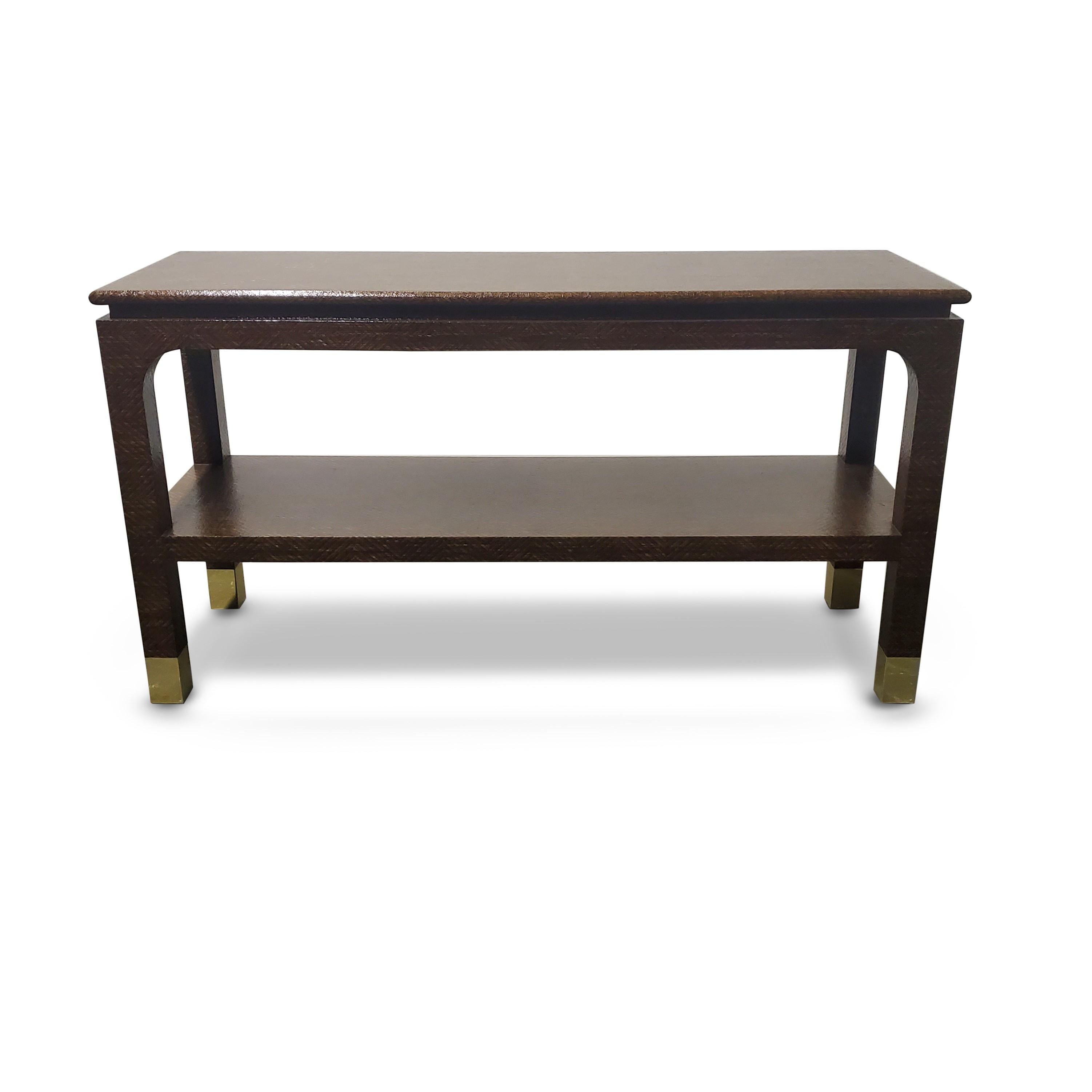 Harrison Van Horn Raffia and brass console table 

Measurement:

Floor to Lower Shelf: 14.5