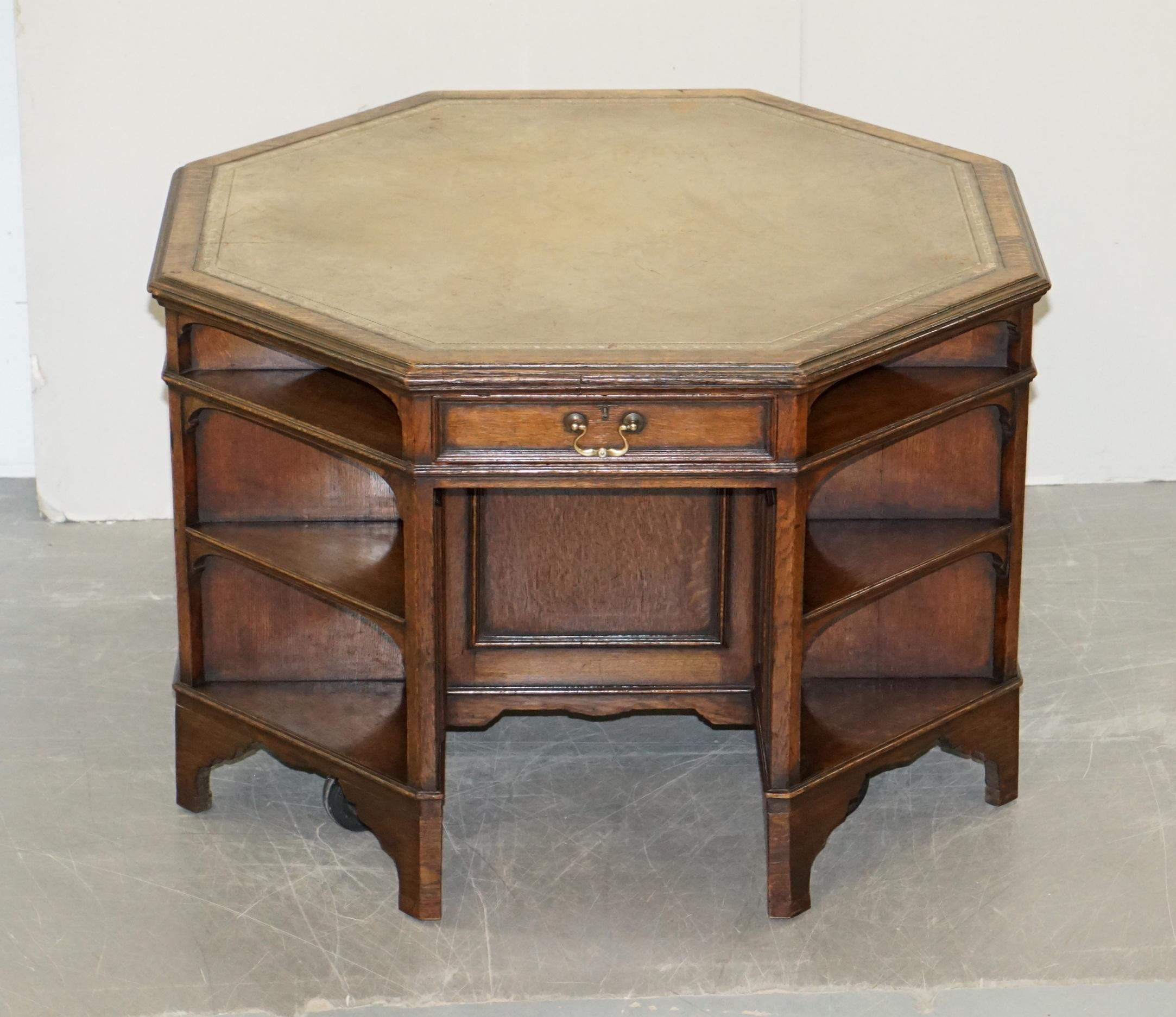 Wimbledon-Furniture

Wimbledon-Furniture is delighted to offer for sale this very rare and highly collectable late Victorian circa 1880-1900 English oak with hand tooled leather top Octagonal two person partner desk with built in bookcase shelves