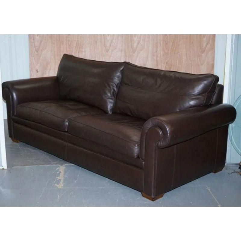 We are delighted to offer this stunning divine Duresta Garrick 3 seater dark brown leather sofa.

Giving you absolute comfort with feather-filled back cushions and two scatter cushion feather filled too. Super soft and has many more years of use.