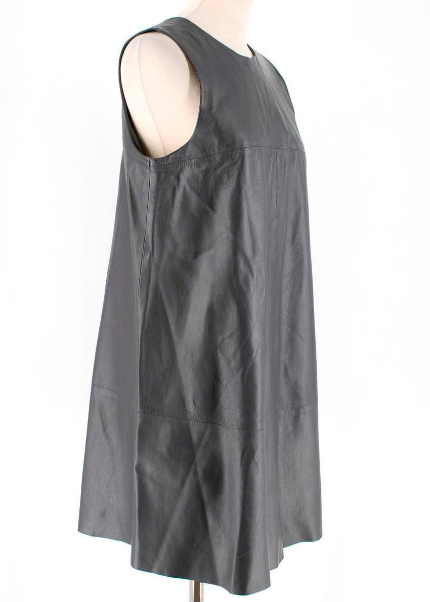 Harrods grey mini dress made of leather featuring a sleeveless design, round neck, concealed zip fastening at back and a short length.

- Lightweight 
- Non-stretchy fabric
- Slightly loose fit 

Composition:
- 100% leather

Care:
- Specialists dry