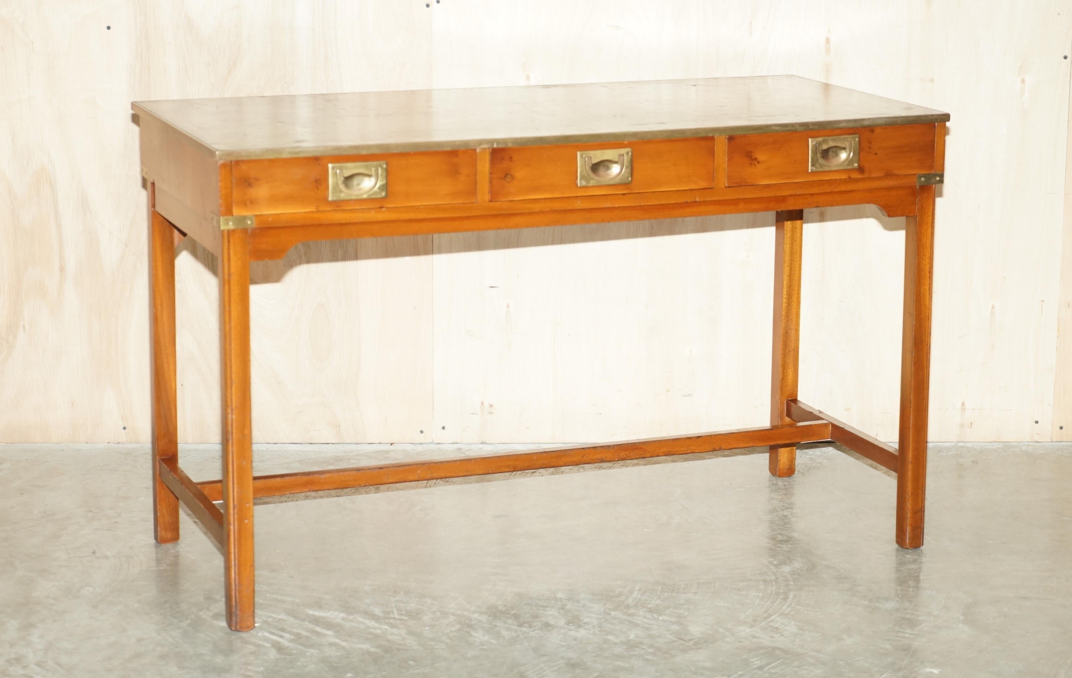 Royal House Antiques

Royal House Antiques is delighted to offer for sale this lovely handmade in England Burr Yew wood Harrods Kennedy Military Campaign writing table desk with Green leather writing surface

Please note the delivery fee listed