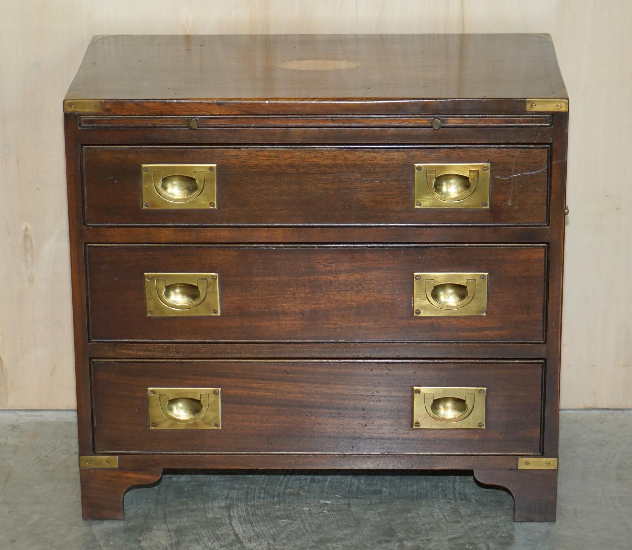 We are delighted to offer for sale this sublime vintage Harrods Kennedy Military Campaign Bachelors chest with butlers serving tray

A truly stunning and well made piece by Kennedy Furniture and retailed through Harrods London, this is a bachelor