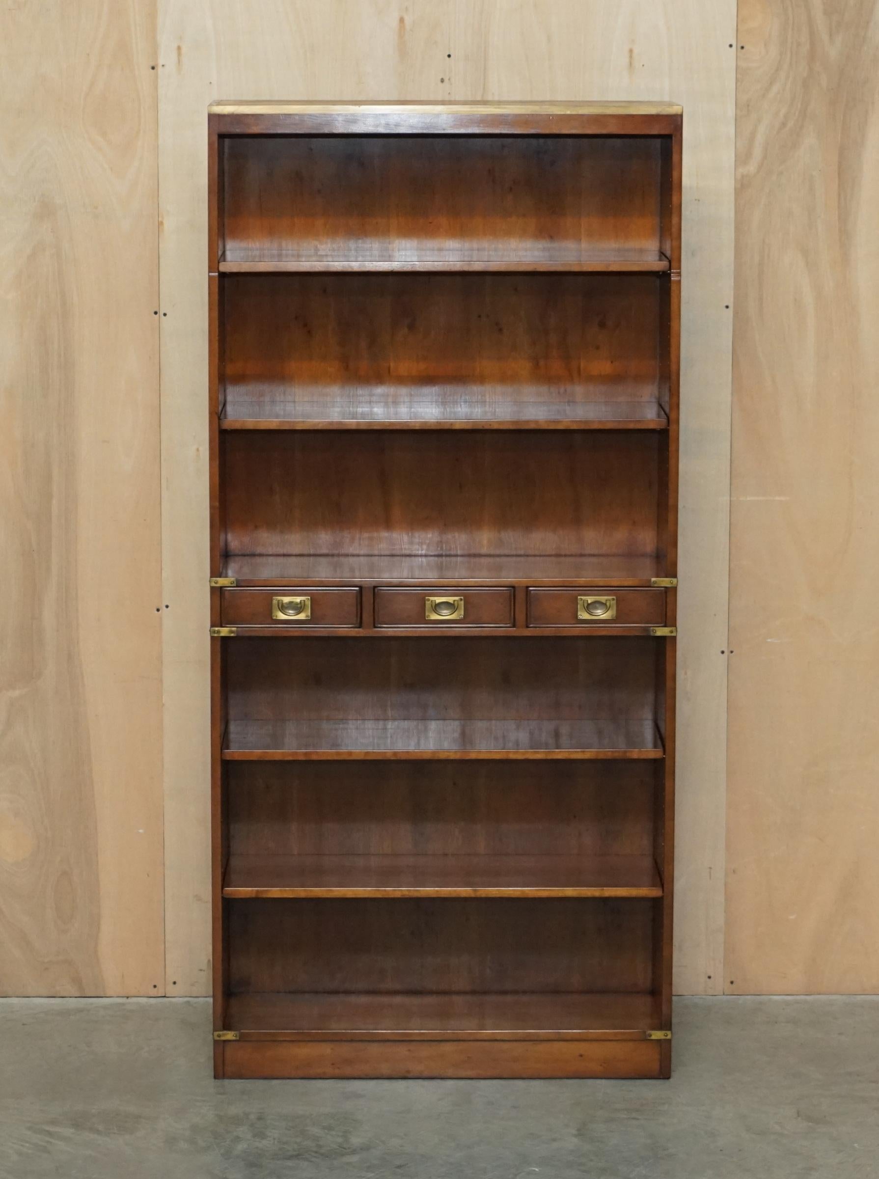 Royal House Antiques

Royal House Antiques is delighted to offer for this lovely vintage Harrods Kennedy Burr Yew wood & Brass Military Campaign three drawer open library bookcase 

Please note the delivery fee listed is just a guide, it covers