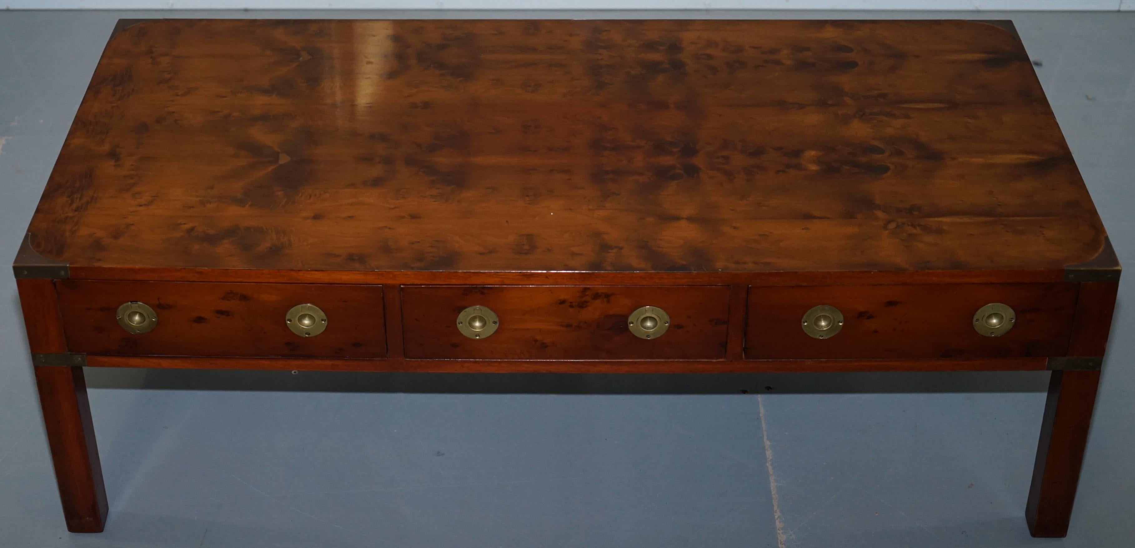 We are delighted to offer for sale this lovely solid Harrods London Kennedy Furniture Burr Yew military campaign coffee table with full-sized drawers 

A rare find in lovely lightly restored condition, we have deep cleaned hand condition waxed and