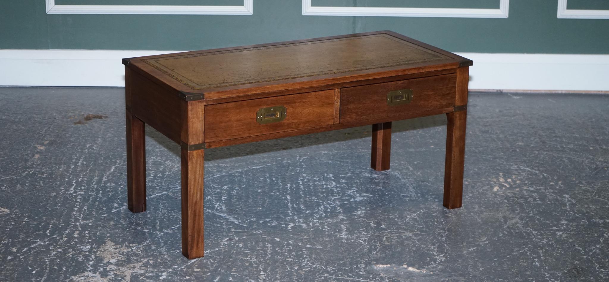 We are delighted to offer for sale this Harrods London Kennedy Military campaign coffee table with a brown leather top.

We have lightly restored this by cleaning it all over, waxing and hand polishing.

Please carefully examine the pictures to