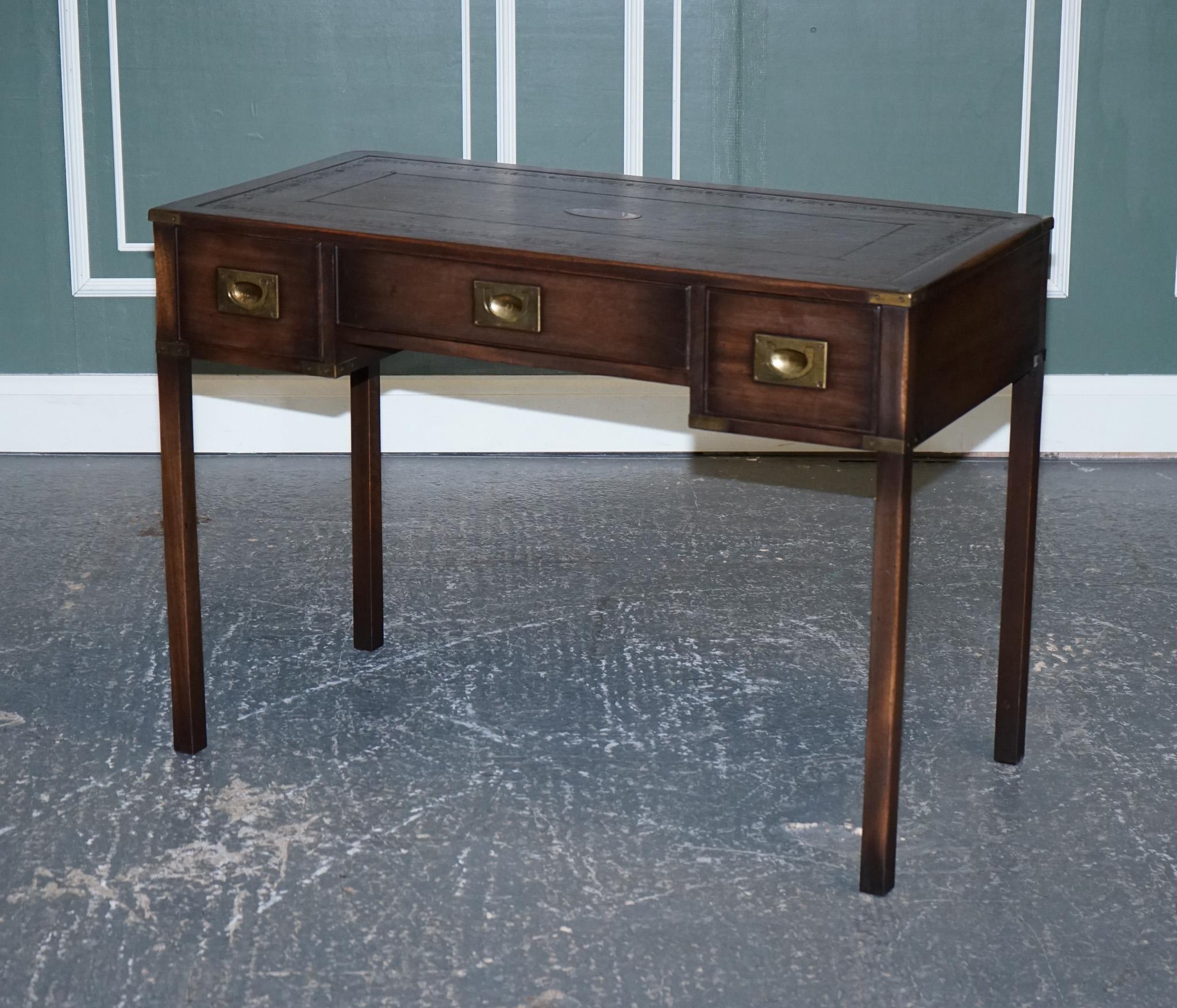 We are delighted to offer for sale this Harrods London REH Kennedy military campaign writing table.

The desk is a very good seize, ideal fro compact spaced whilst still maximising the use of the surface work area. It has five good sized drawers