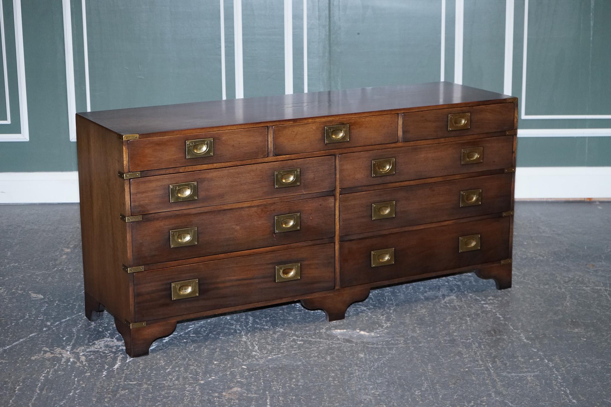 We are delighted to offer for sale this Harrods London Kennedy Military Campaign Sideboard Chest Of Drawers.

A very well-made and decorative piece, these campaign sideboards are highly collectable and very useful pieces of furniture. 

It can