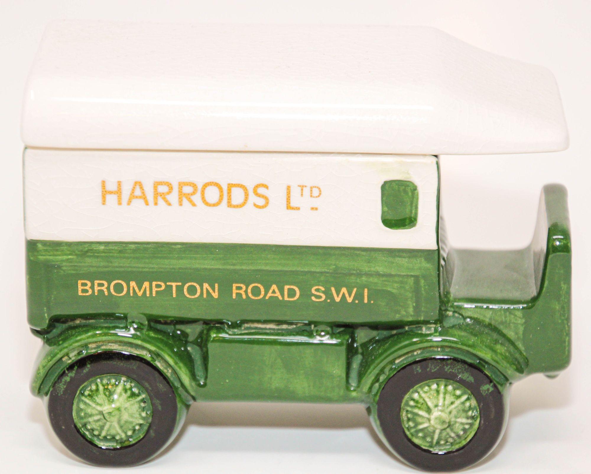 Harrods ceramic delivery truck, lidded candy or trinket box, London, England.
Hand painted ceramic small tea caddy box, trinket truck box.
Vintage Harrods Ltd London Pottery Lidded Van Truck Tea Caddy Trinket Key Box.
This ceramic truck with lid