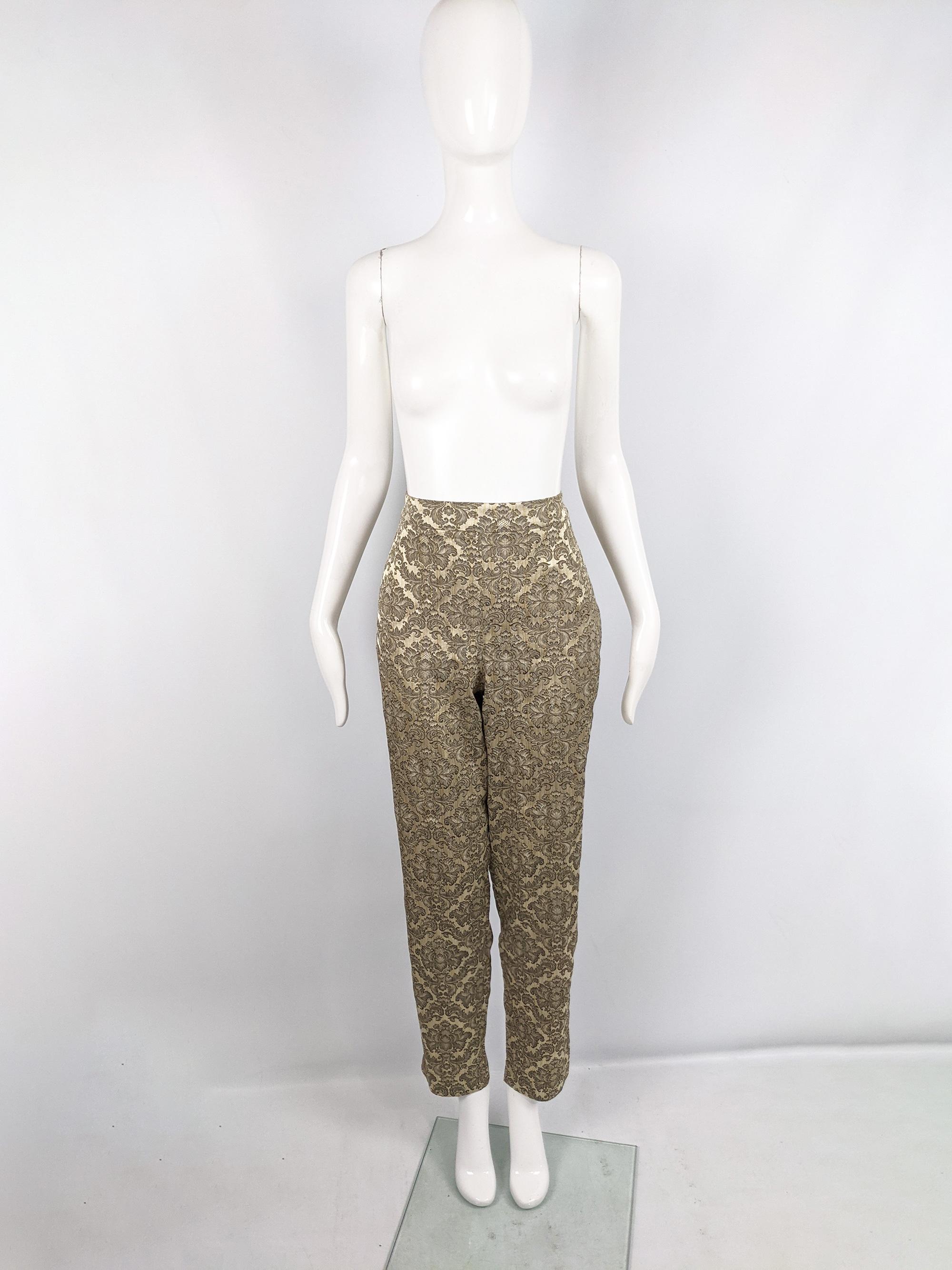 A chic pair of vintage cigarette pants from the 80s by luxury British department store, Harrods. In an opulent gold satin jacquard fabric with a damask pattern throughout and a high waist and tapered leg. Perfect for a party. 

Size: Marked vintage