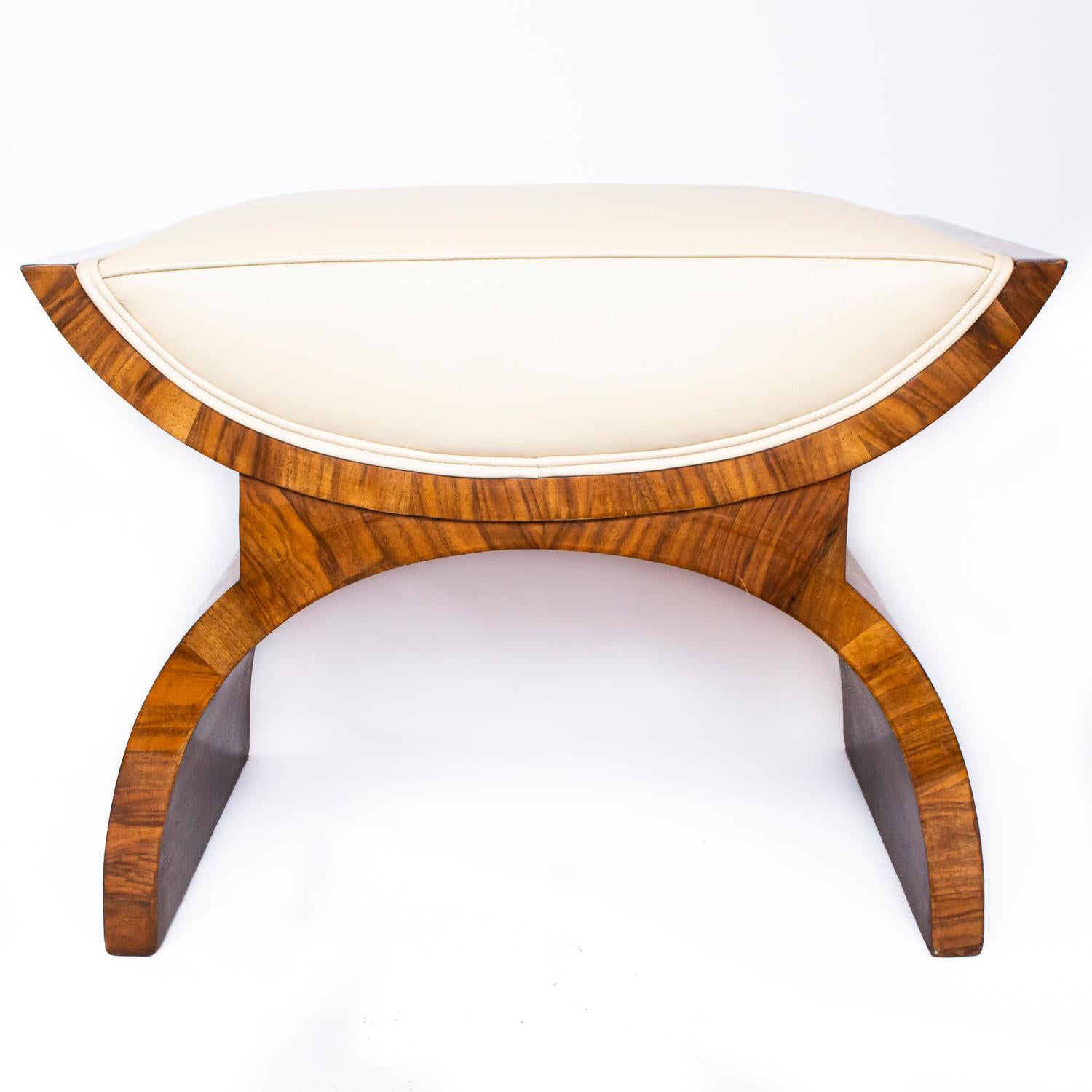 An X-Frame, Art Deco footstool by Harry and Lou Epstein. Walnut wood and cream leather.

Dimensions: H 46cm, W 64cm, D 44cm 

Origin: English

Date: circa 1930

Maker: Harry & Lou Epstein

Item no: 1103203

All of our furniture is