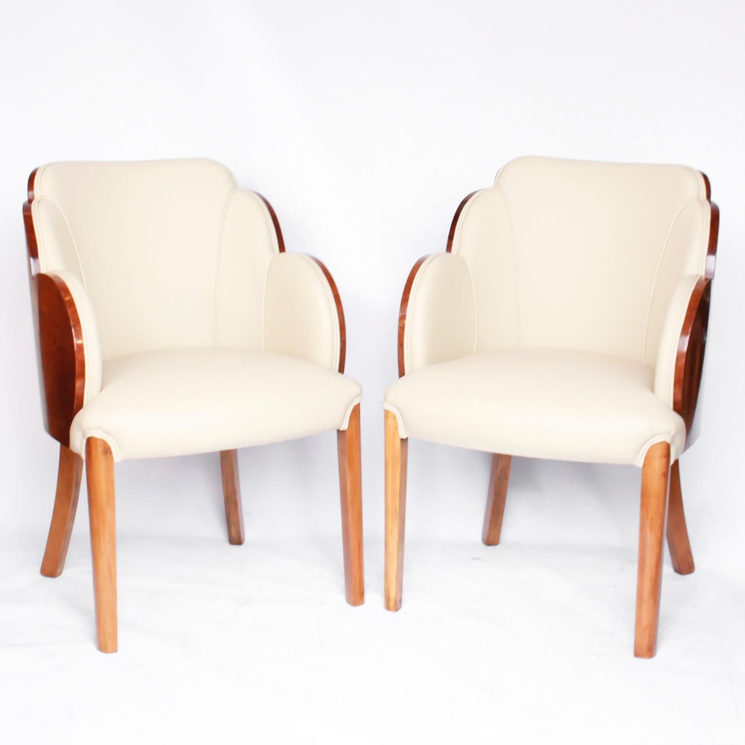 A pair of Art Deco cloud back armchairs, re-upholstered in cream leather and Alcantara suede.

Dimensions: H 85cm, W 57cm, Seat H 50cm, Seat D 50cm

Origin: English

Date: circa 1935

Item No: 1410193