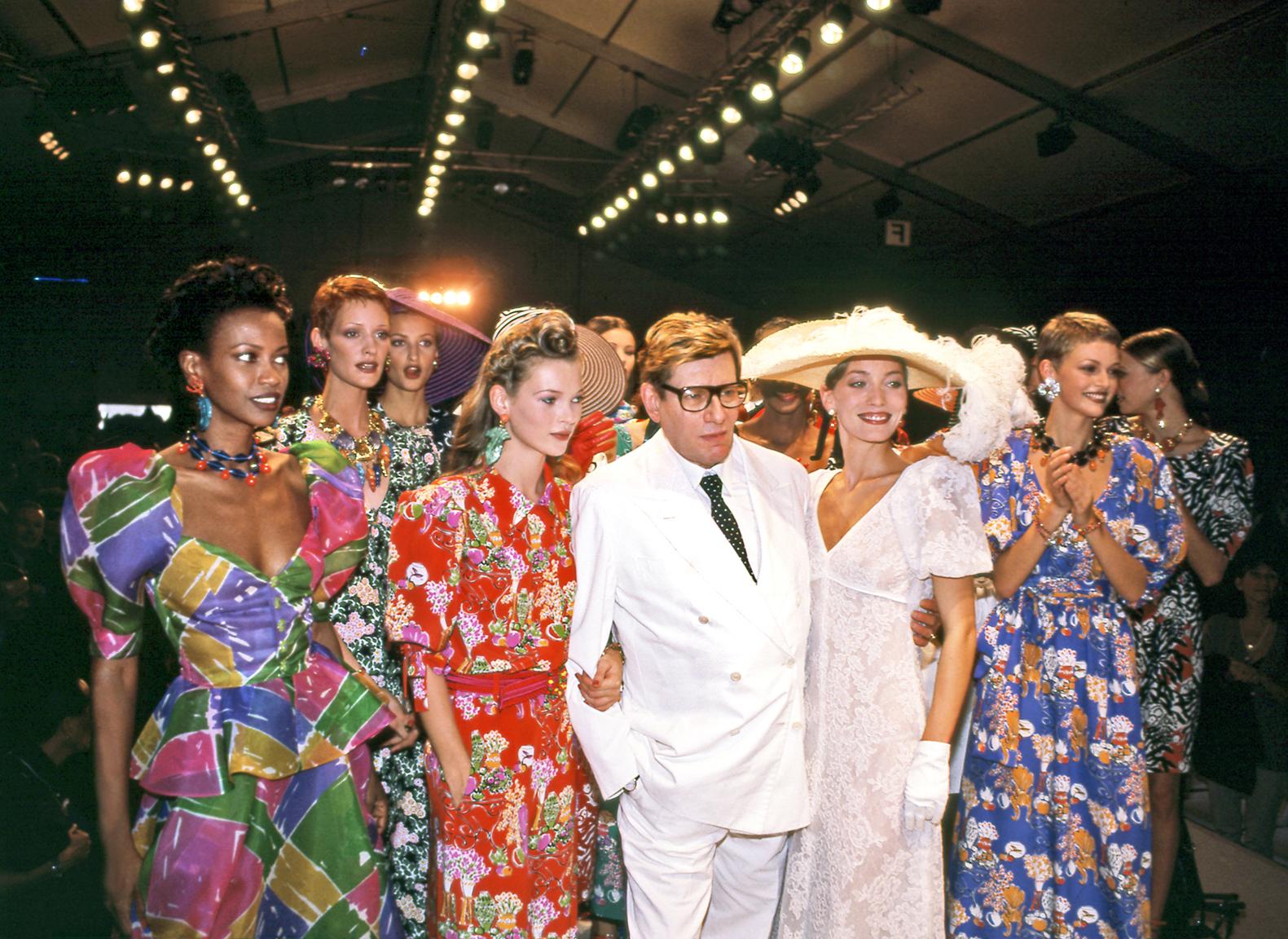 Harry Benson Color Photograph - Yves St. Laurent with Kate Moss and Models, Paris